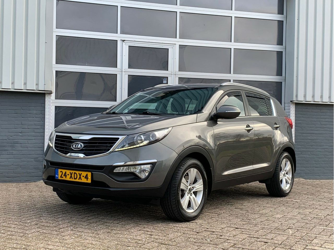 Kia Sportage 1.6 GDI X-ecutive + 2012 - voorkant