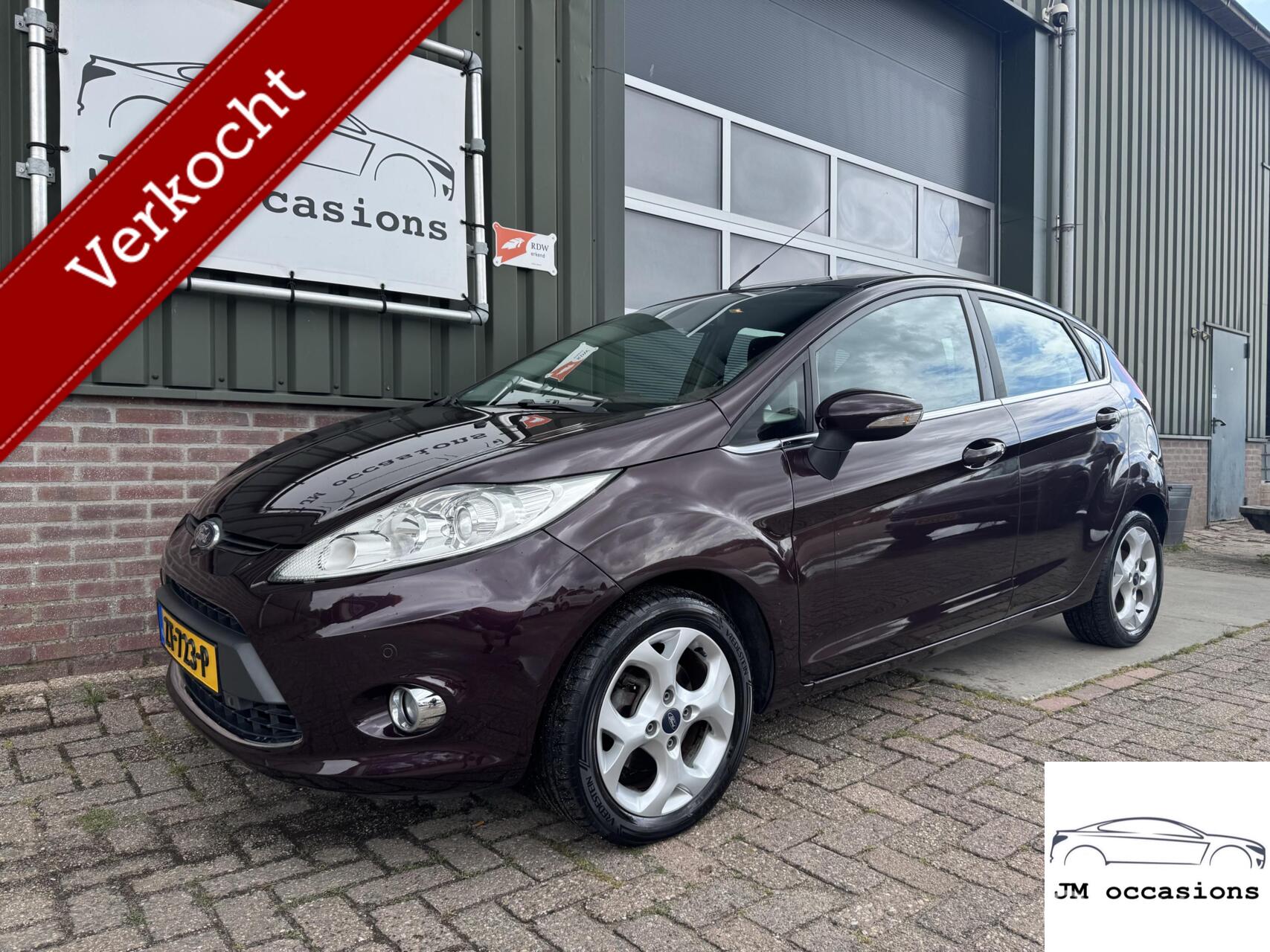 Ford Fiesta 1.4 Ghia|Airco|PDC|Stoel vw|Lm velgen|APK 3-2026 2010 - voorkant