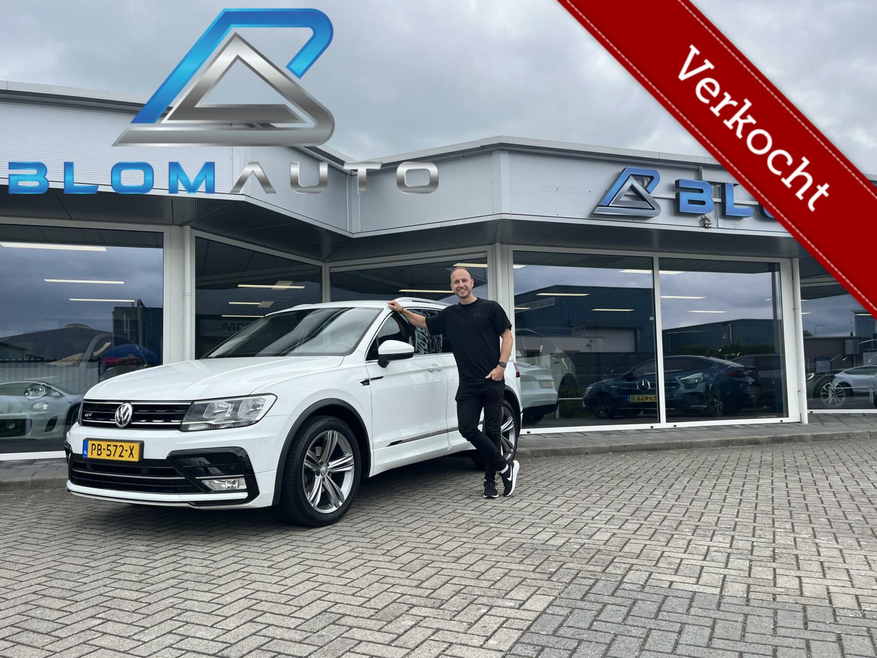 Volkswagen Tiguan 1.4 TSI R-LINE EL. TREKHAAK+CARPLAY+NLAUTO 2017 - voorkant
