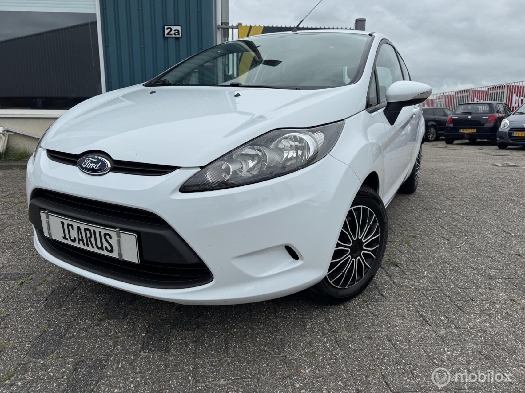 Ford Fiesta 1.25 Limited new apk|airco|boekjes 2012 - voorkant