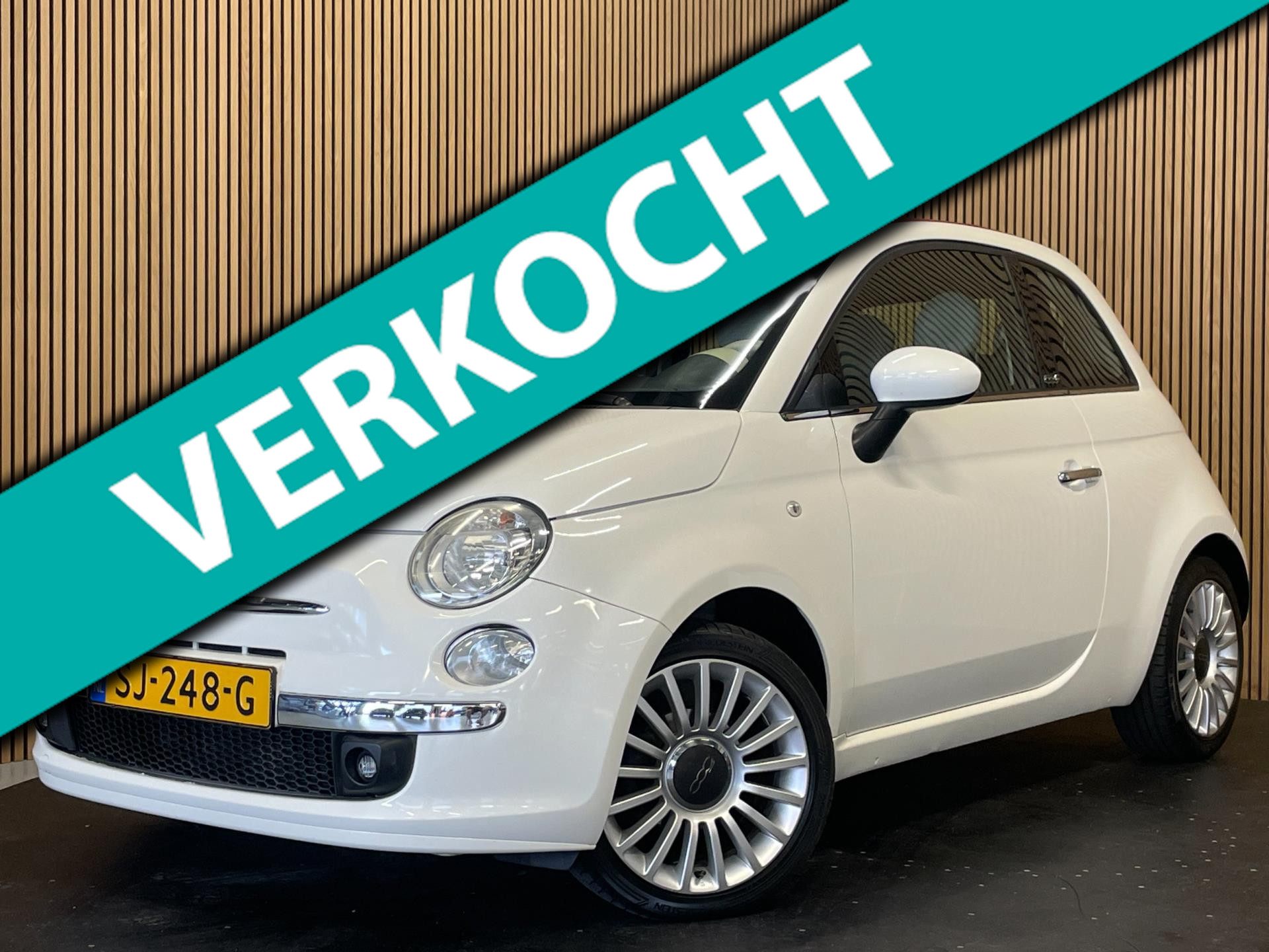 Fiat Fiat 500 1.2|CABRIO|AIRCO|4 CILINDER|69PK|1/2 LEDER|BLUETOOTH|PDC|WIT-ROOD| 2011 - voorkant
