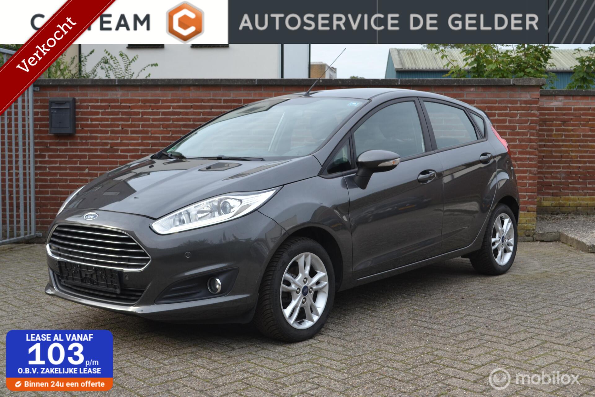 Ford Fiesta 1.25 Titanium | Stoelverwarming | Airco | Parkeersensoren V+A | Verkocht 2015 - voorkant