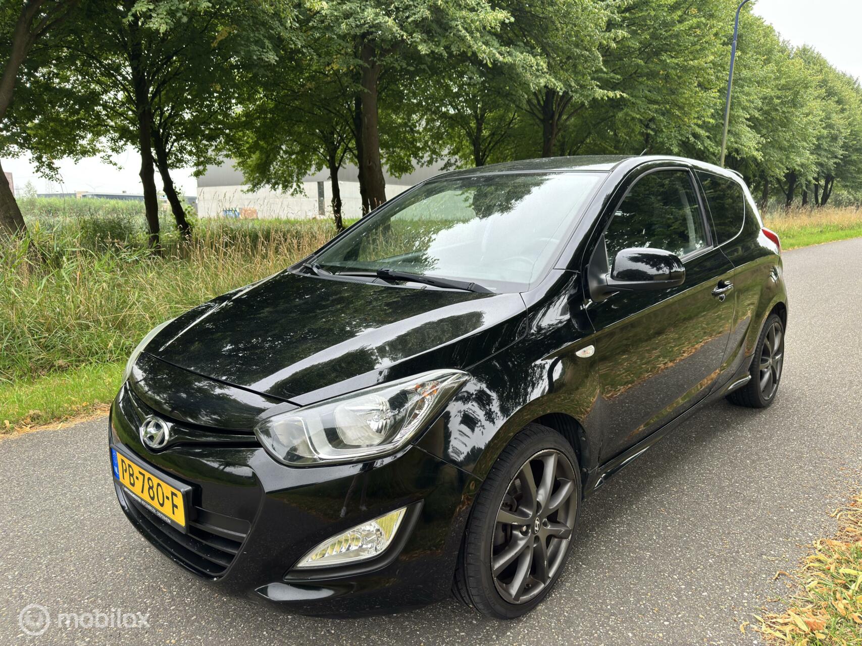 Hyundai I20 1.2i i-Vision*AIRCO*APK 02/26*ELEK. RAMEN 2014 - voorkant