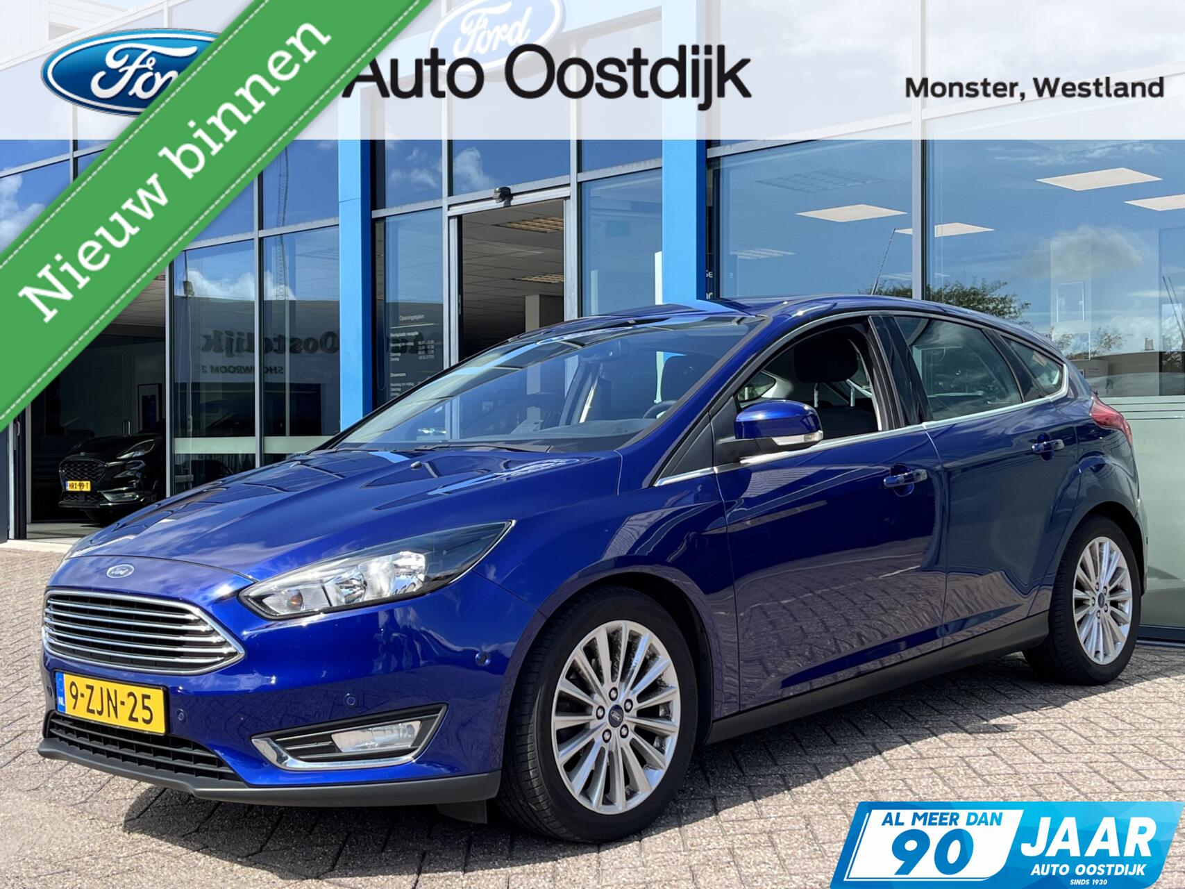 Ford Focus 1.0 Titanium 125PK Trekhaak NIEUWE DISTRIBUTIERIEM!! Voorruitverwarming Climate Cruise Parkeersensoren Navi 17" Velgen *Dealer Onderhouden* 2015 - voorkant