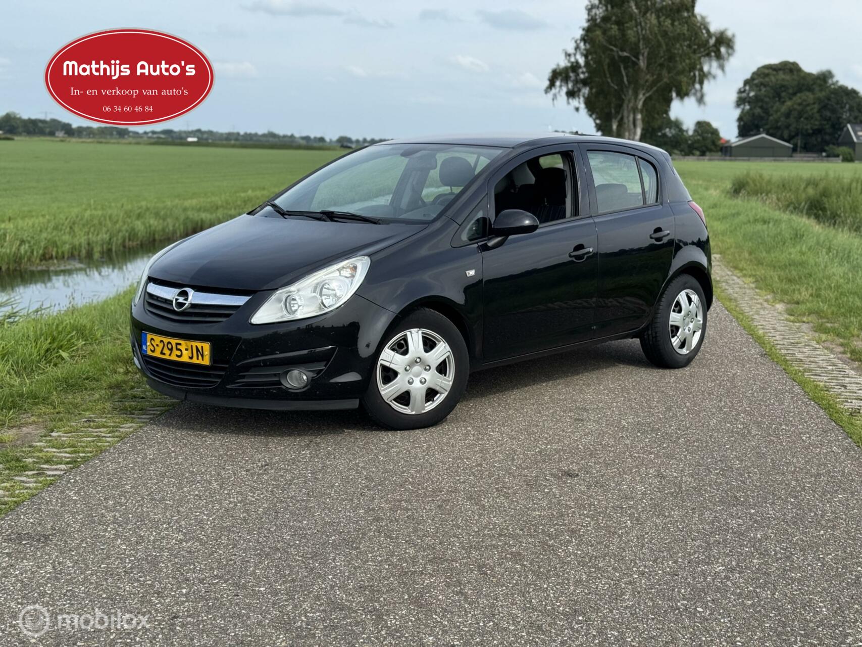 Opel Corsa 1.2-16V Cosmo 5 deurs airco! 2009 - voorkant