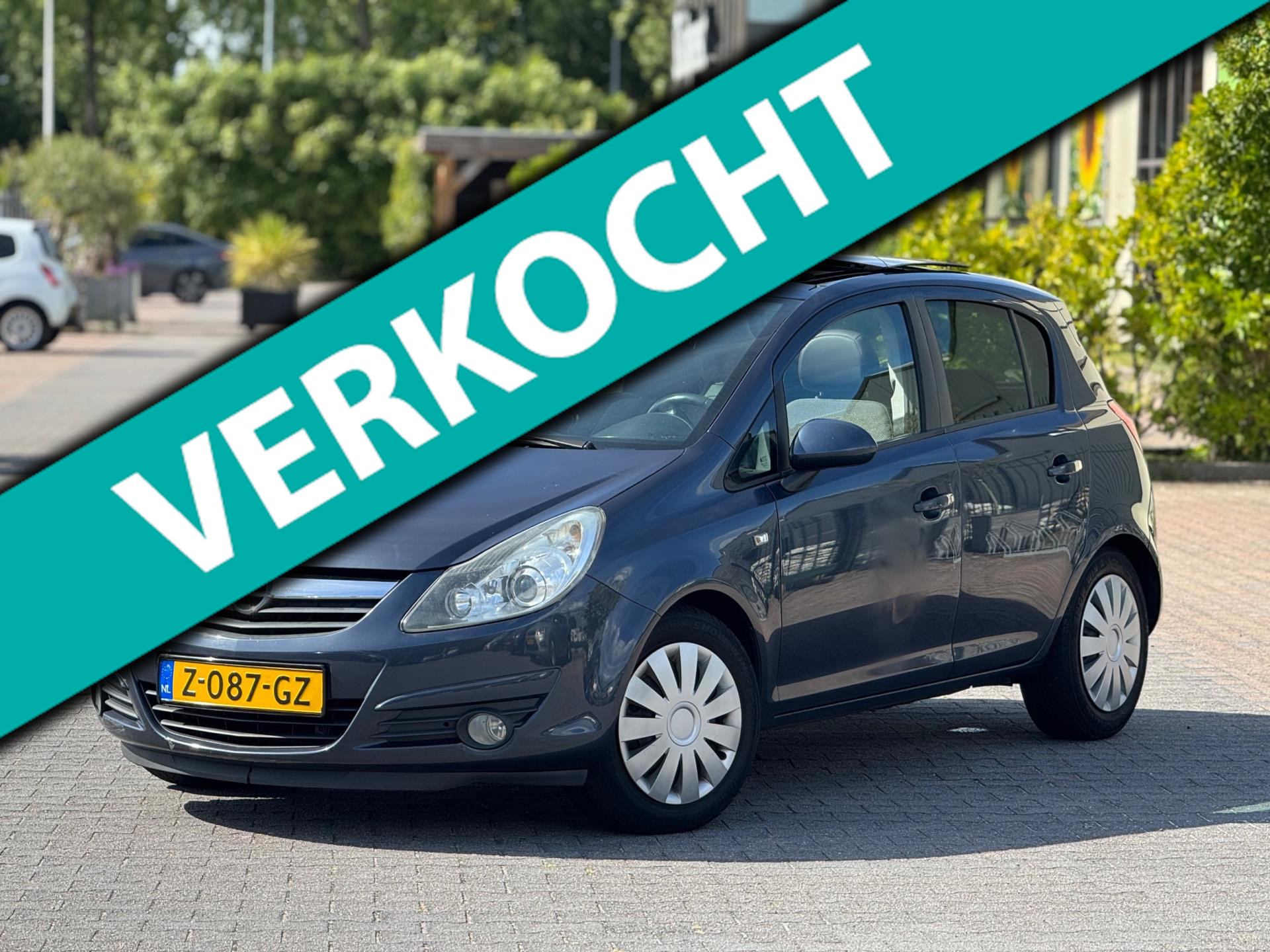 Opel Corsa 1.4-16V Cosmo | Panoramadak | Stuurverwarming en stoel verwarming | Cruise Control | 2009 - voorkant