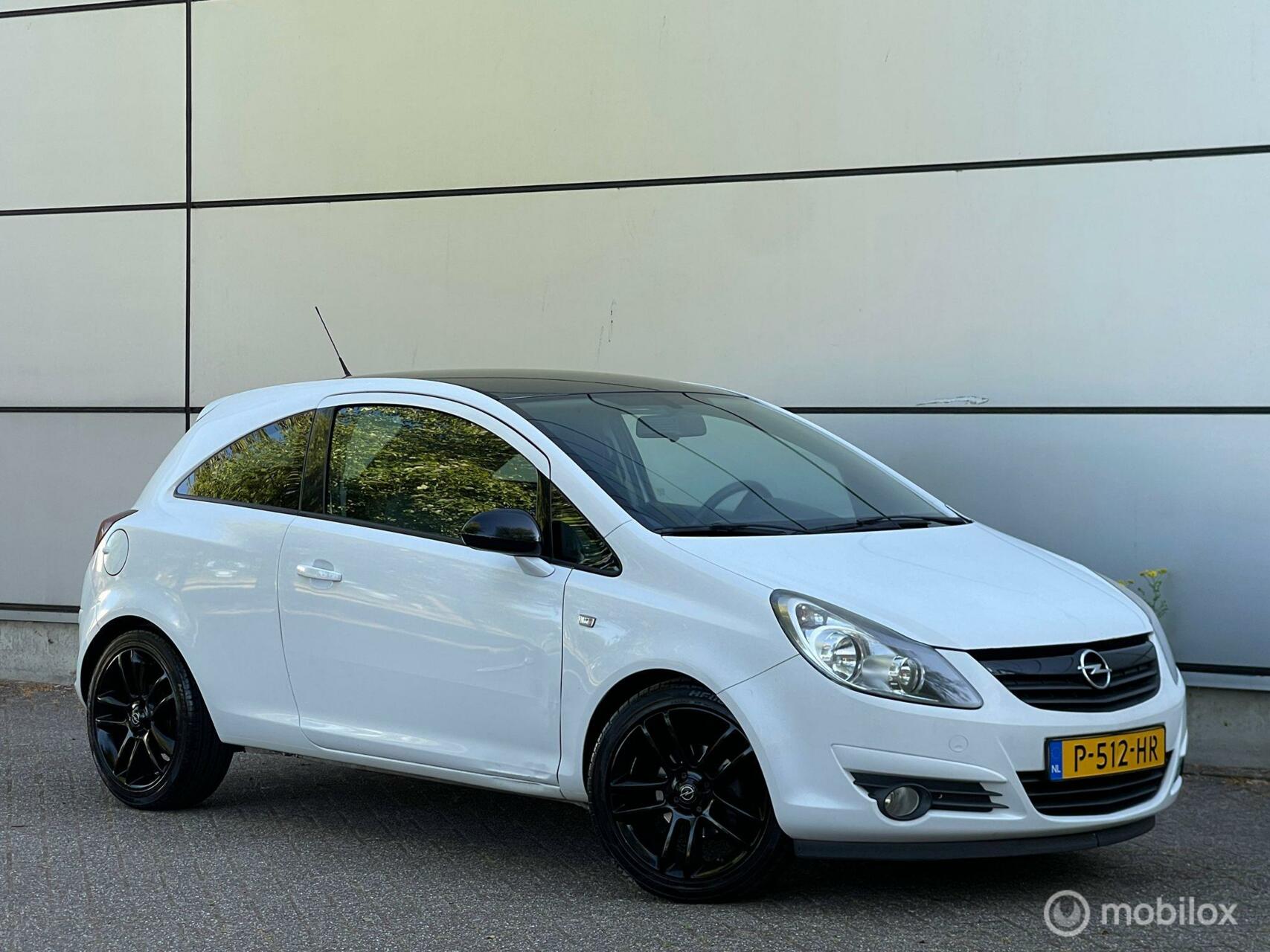 Opel Corsa 1.2- 16V Leder |Airco |Stuurbed |Lmv |Nap |Boekje 2009 - voorkant