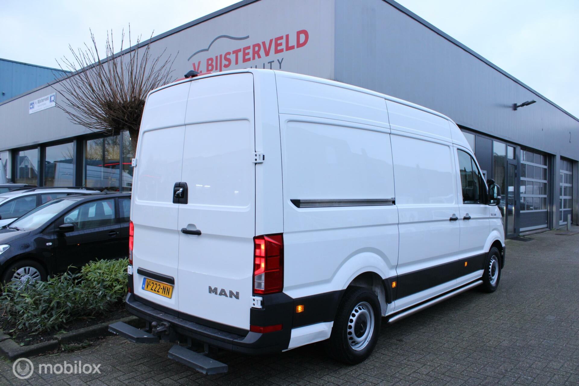 Foto van Man Tge