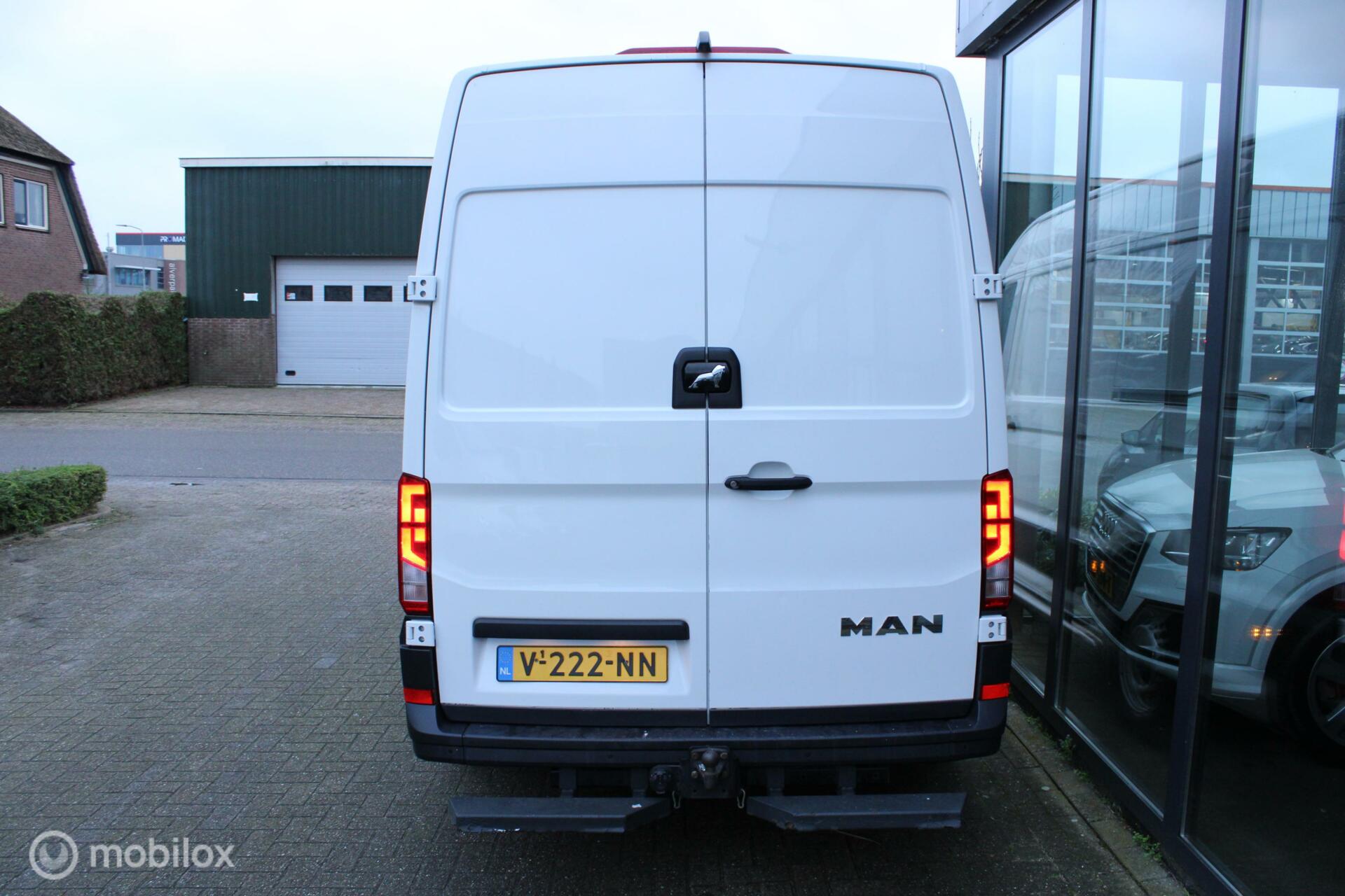 Foto van Man Tge