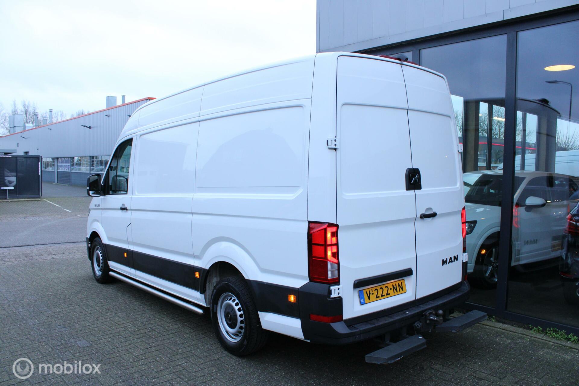 Foto van Man Tge