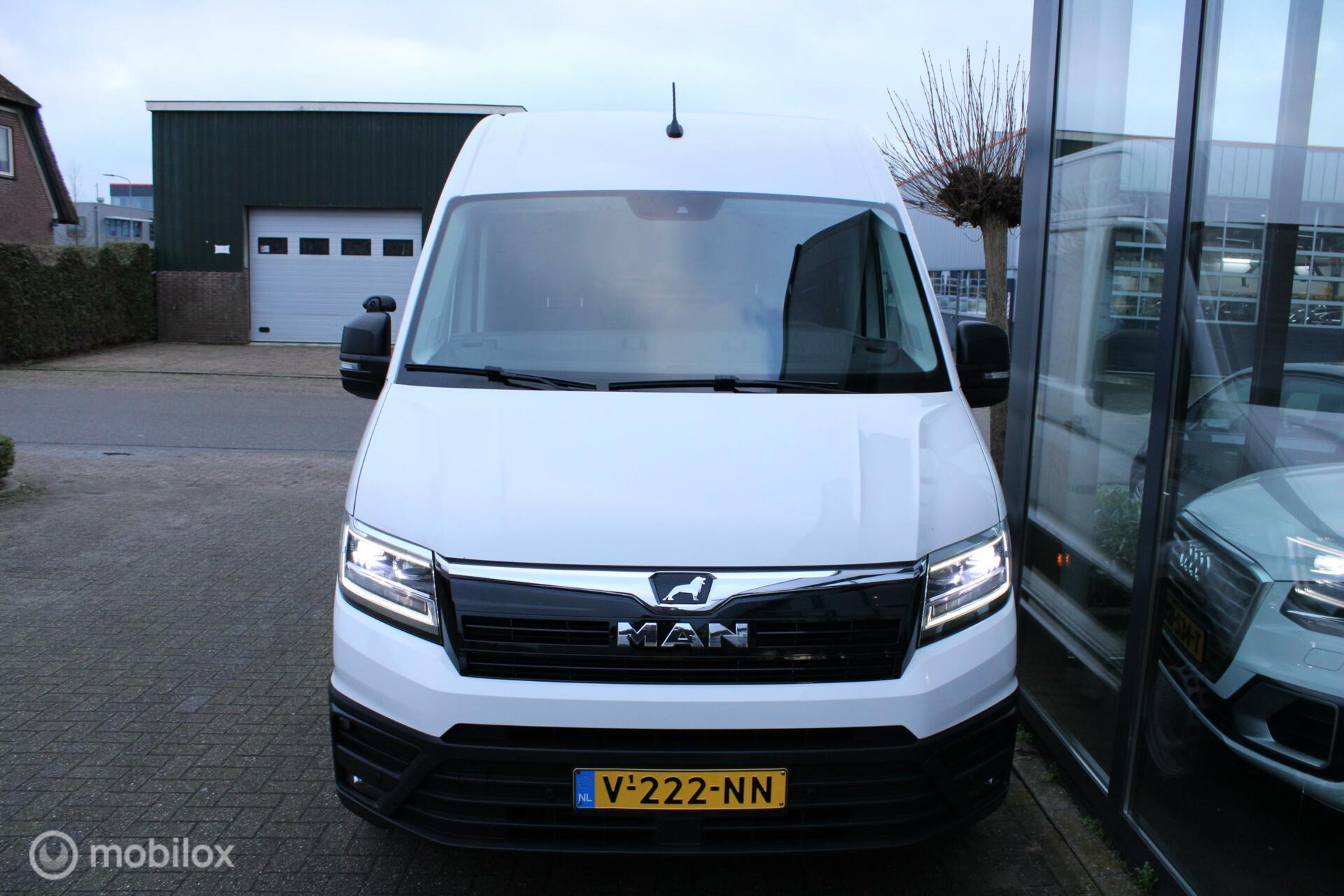 Foto van Man Tge