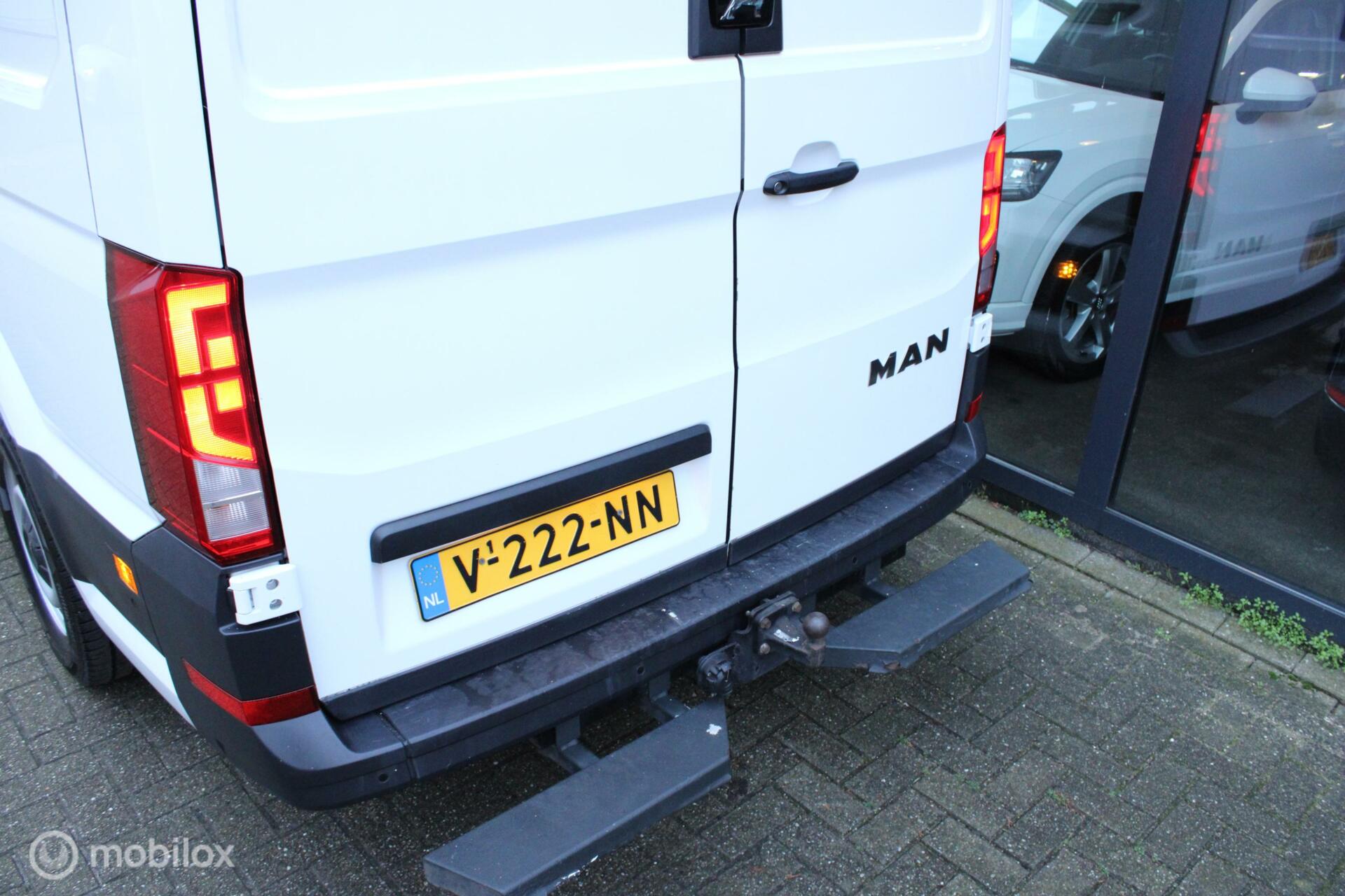 Foto van Man Tge