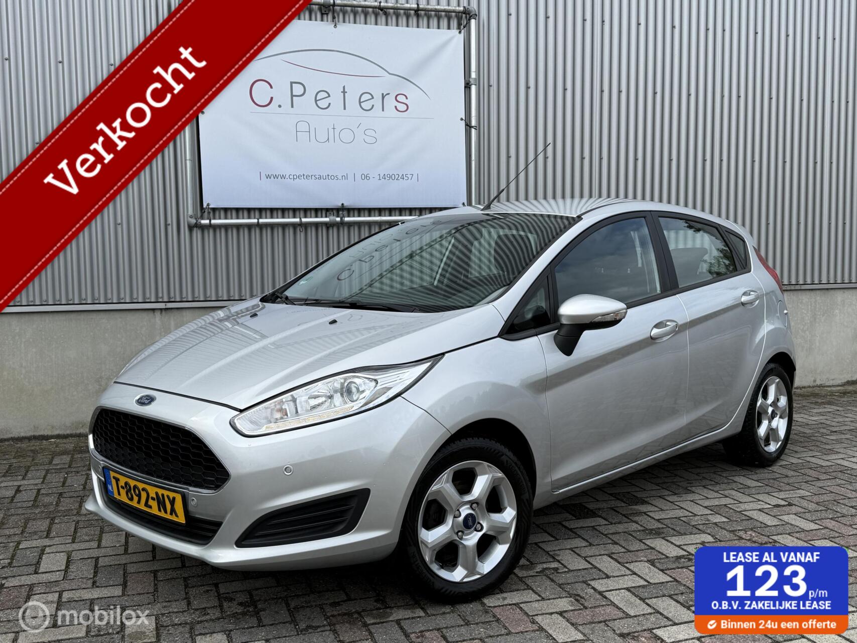 Ford Fiesta VERKOCHT 1.0 Style Ultimate 80pk 12-2017 / 5deurs / Bluetooth / Parkeersensoren / Airco / 2e eigenaar NAP 2017 - voorkant