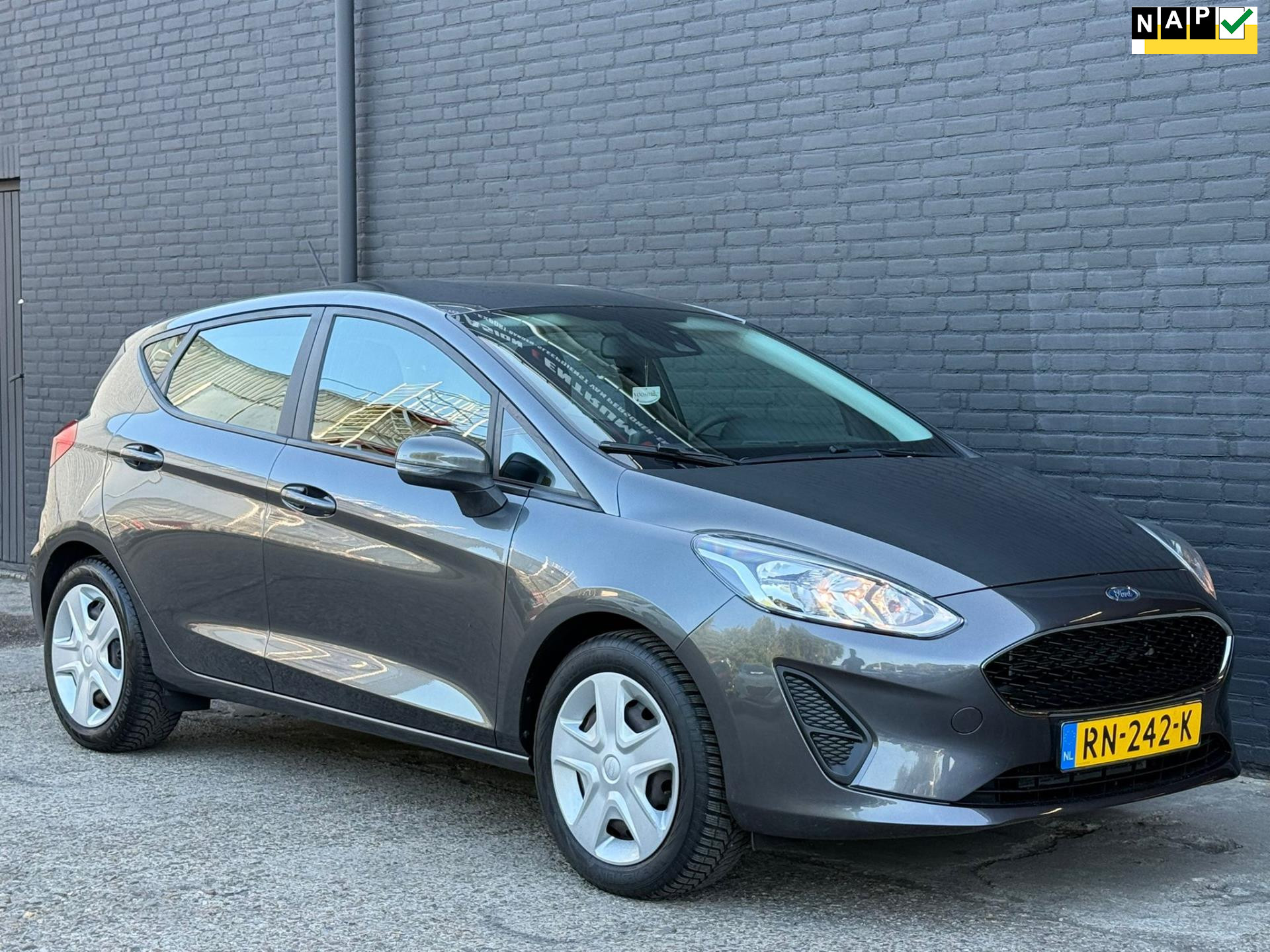 Ford Fiesta 1.1 Trend NAVI | PDC | CARPLAY | AIRCO | NWE APK 2018 - voorkant