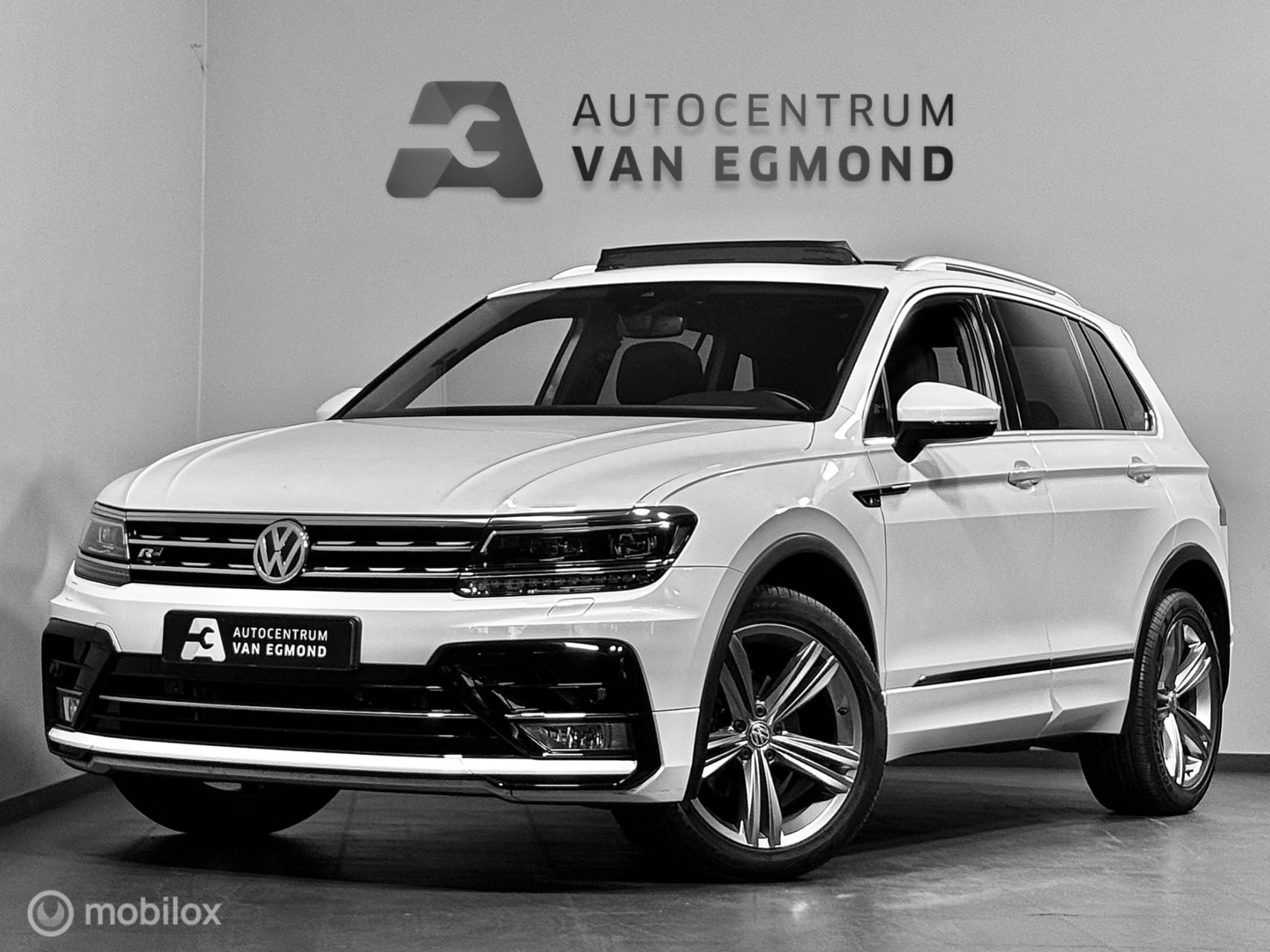 Volkswagen Tiguan 1.4 TSI DSG 2X R-LINE | PANO | TREKHAAK 2016 - voorkant