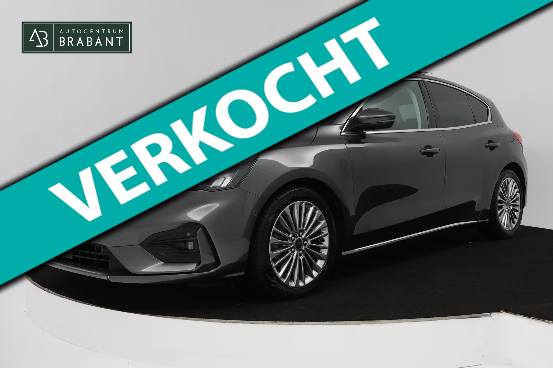 Ford Focus 1.0 EcoBoost Titanium Business (PANORAMADAK, TREKHAAK, ACHTERUITRIJCAMERA, STOEL/STUUR VERWARMING, SFEER) 2019 - voorkant