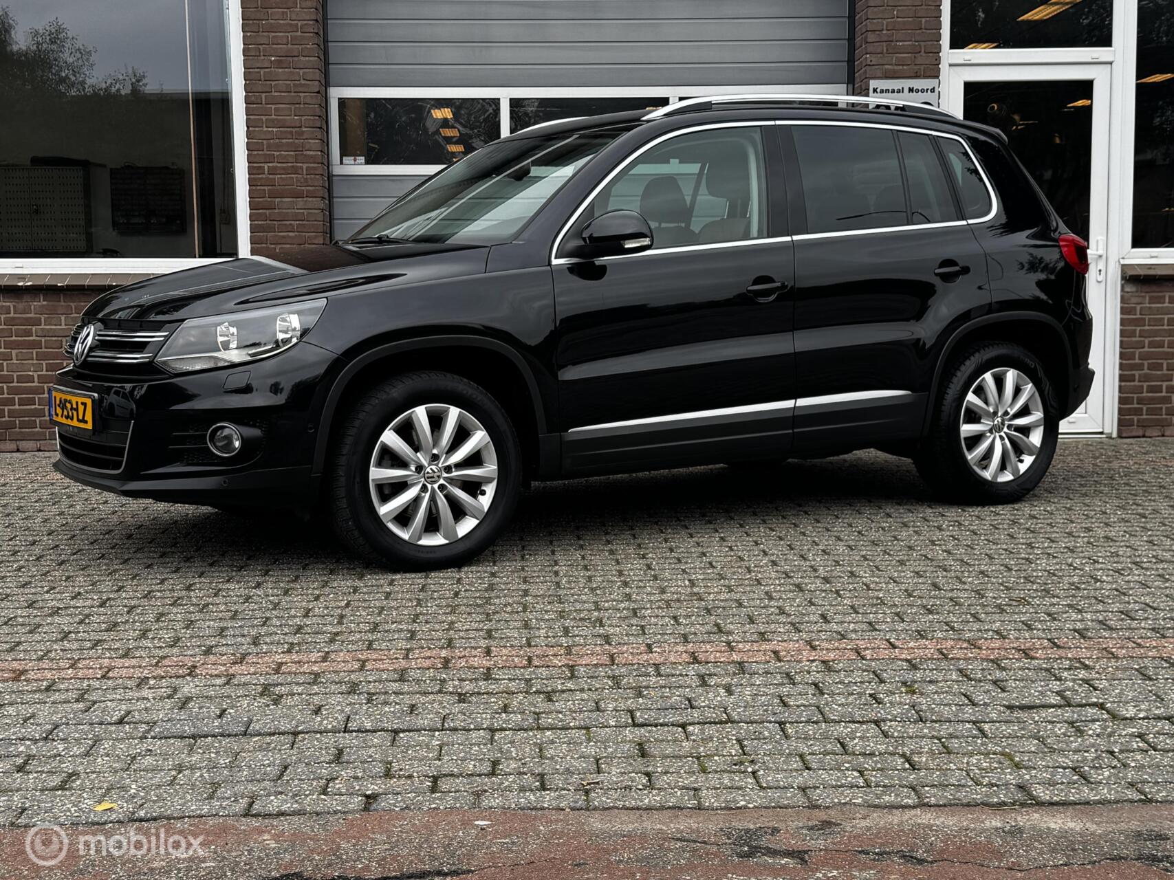 Volkswagen Tiguan 2.0 TSI 4 MOTION AIRCO/CRUISE/STOEL.VW 2011 - voorkant