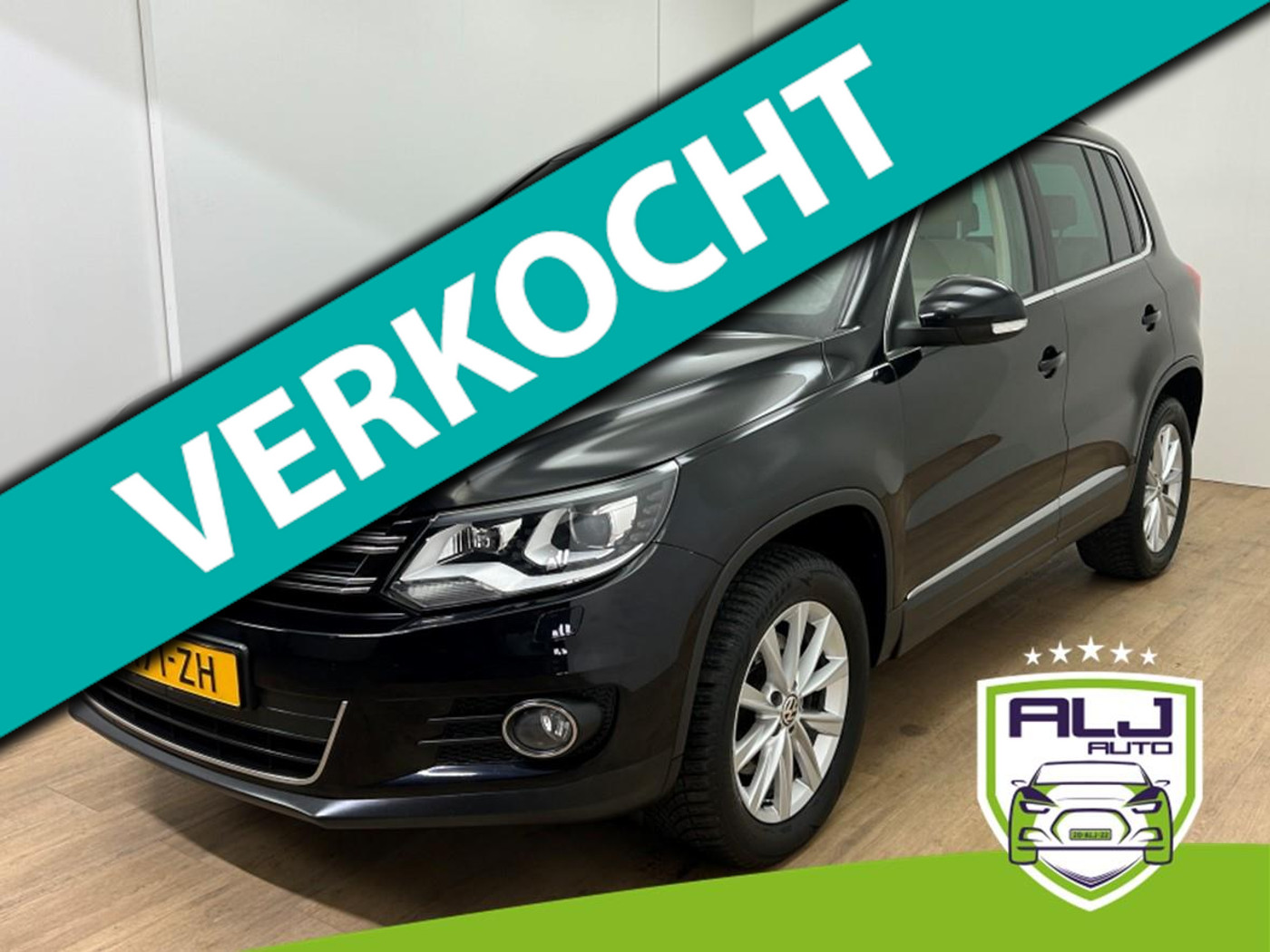 Volkswagen Tiguan Occasion 2.0 TSI Sport&Style 4Motion | Tweedehands Volkswagen Tiguan | Zwart | Stoelverwarming | Panoramadak 2011 - voorkant