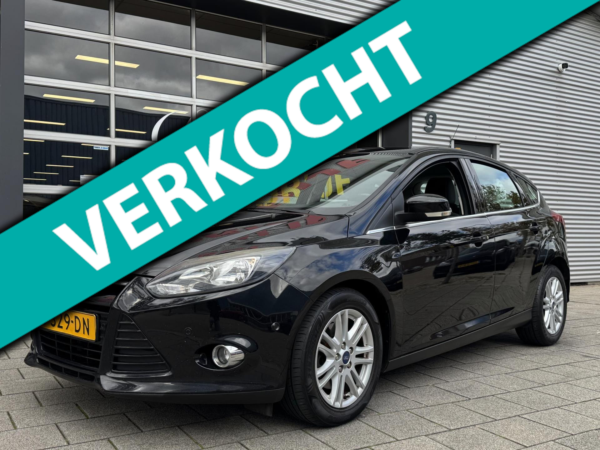 Ford Focus 1.6 EcoBoost - Navigatie I Titanium I Airco I PDC I Sport velgen I Dealer onderhouden 2013 - voorkant