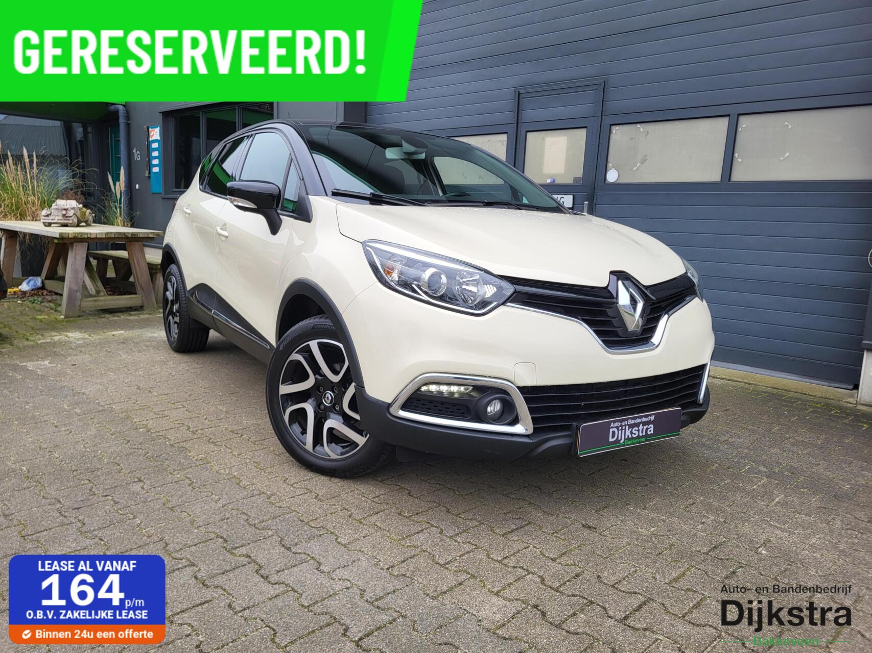 Renault Captur 0.9 TCe Dynamique Achteruitrijcamera/ private glass/ trekhaak/ navigatie 2017 - voorkant