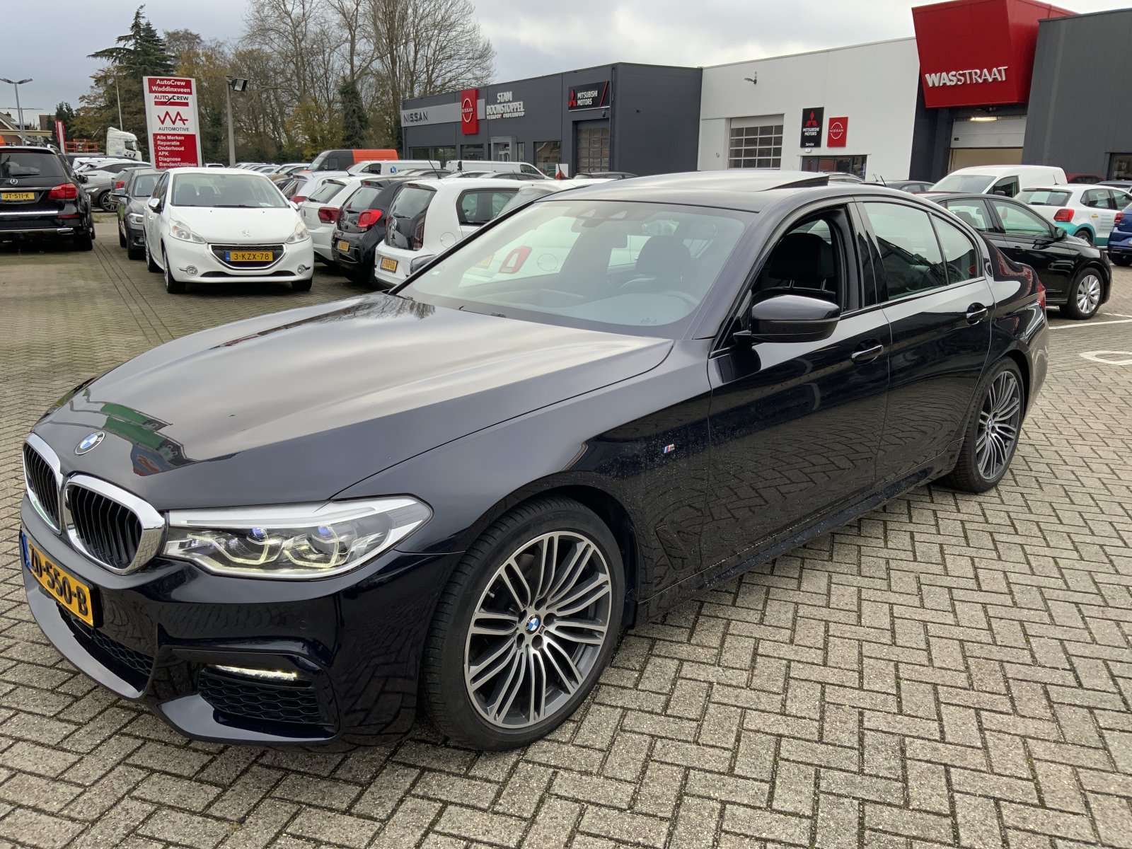 BMW 5-serie 520i Corp. L. H. Ex. 2019 - voorkant