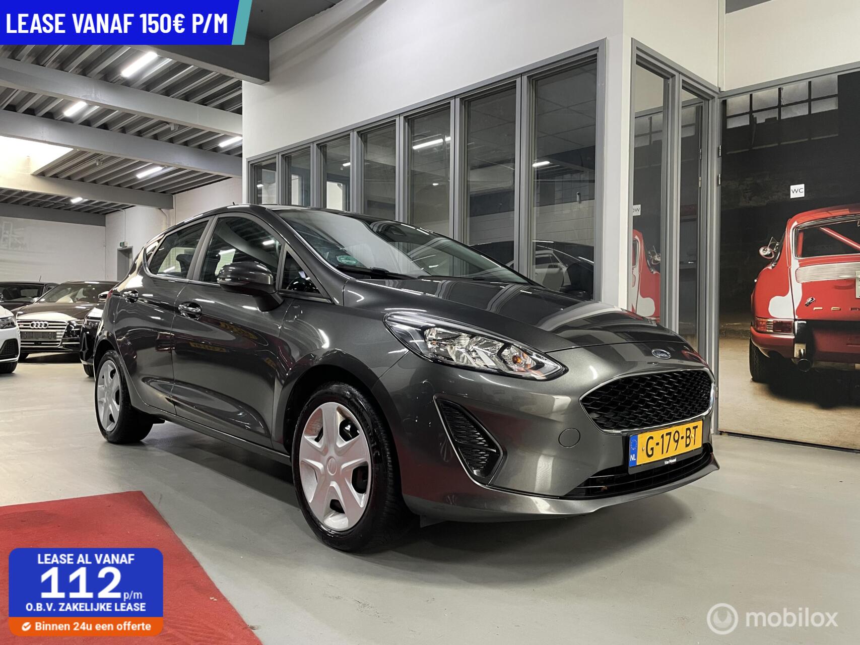 Ford Fiesta 1.1 Trend AIRCO ELEK RAMEN / PDC / Apple CarPlay nw apk netjes 2019 - voorkant