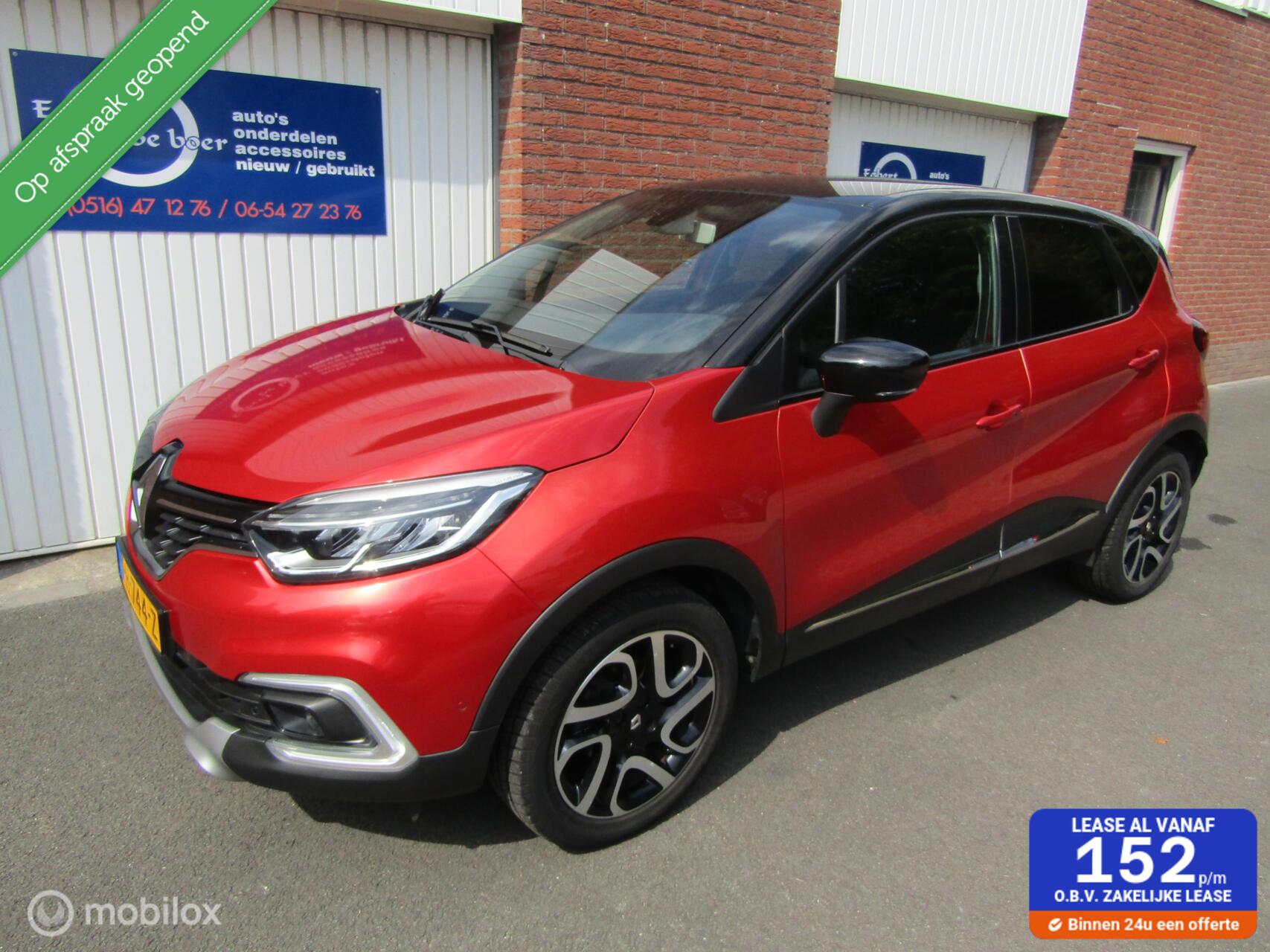Renault Captur 0.9 TCe Intens bj:2017 142888 km rood + zwart 2017 - voorkant