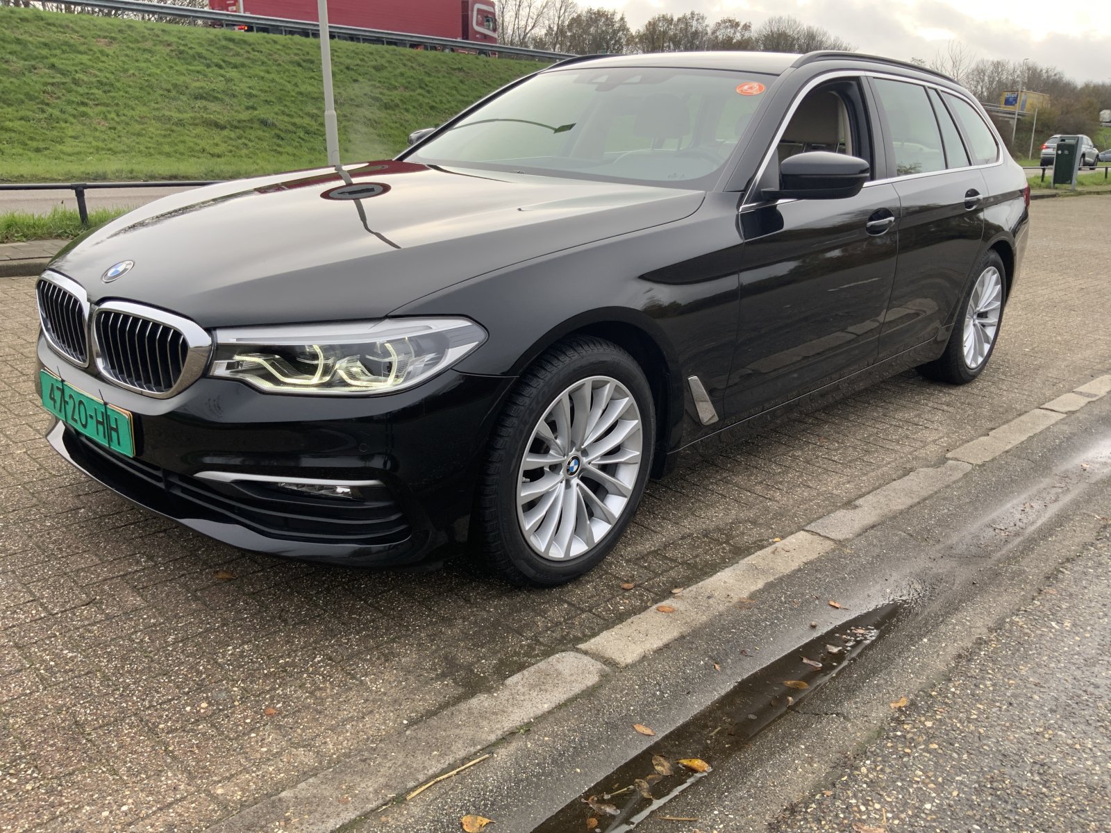 BMW 5-serie Touring 520i High Executive Edition 2020 - voorkant