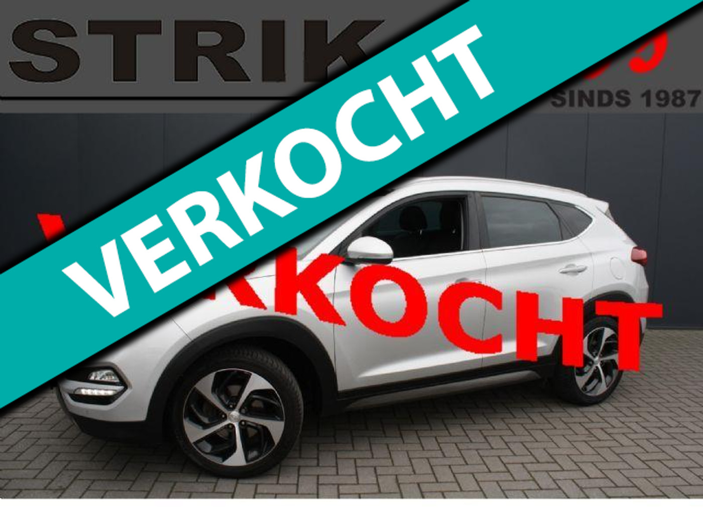 Hyundai Tucson 1.6 T-GDi 177PK Premium - LEDER - NAVIGATIE - CAMERA - TREKHAAK - PDC 2016 - voorkant