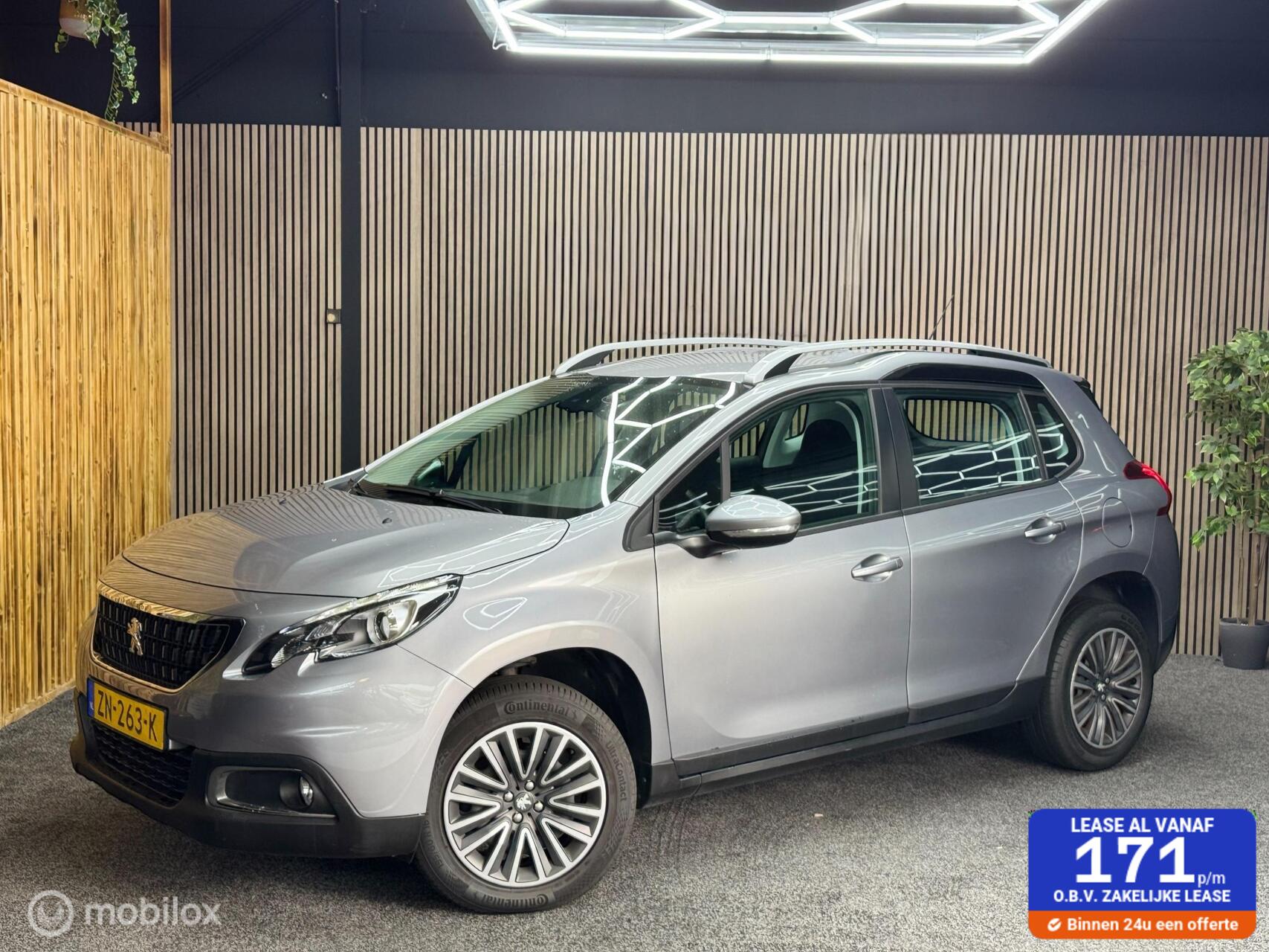 Peugeot 2008 1.2 PureTech Blue Lion |LED|PDC|Navi| 2019 - voorkant