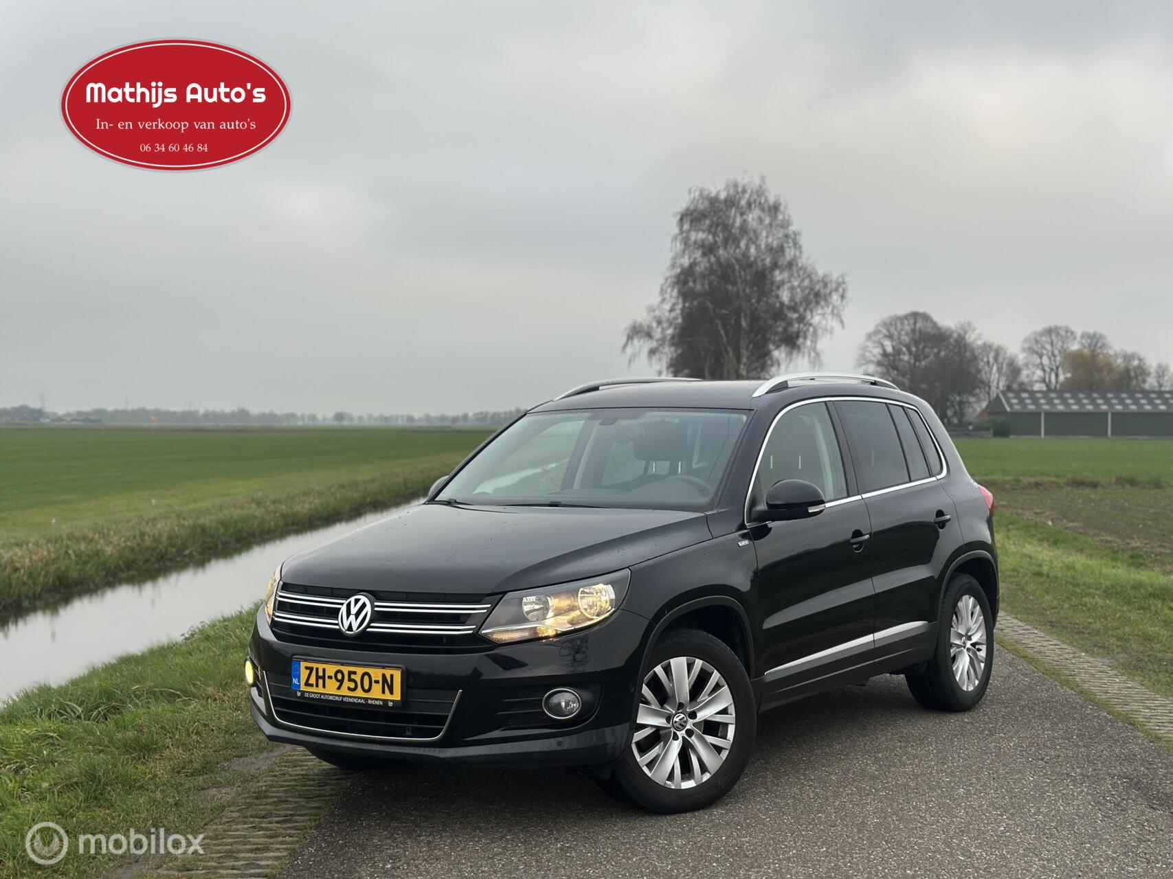 Volkswagen Tiguan 1.4 TSI Sport&Style 100% onderhouden! 2013 - voorkant