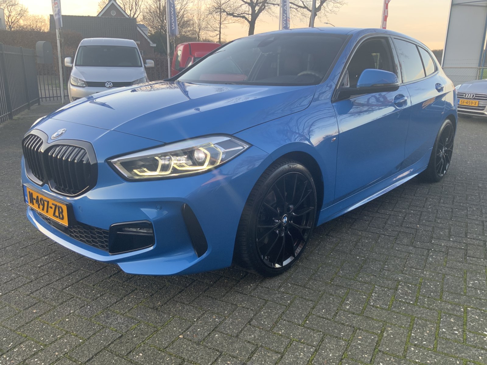 BMW 1-serie 118i High Exec 2021 - voorkant