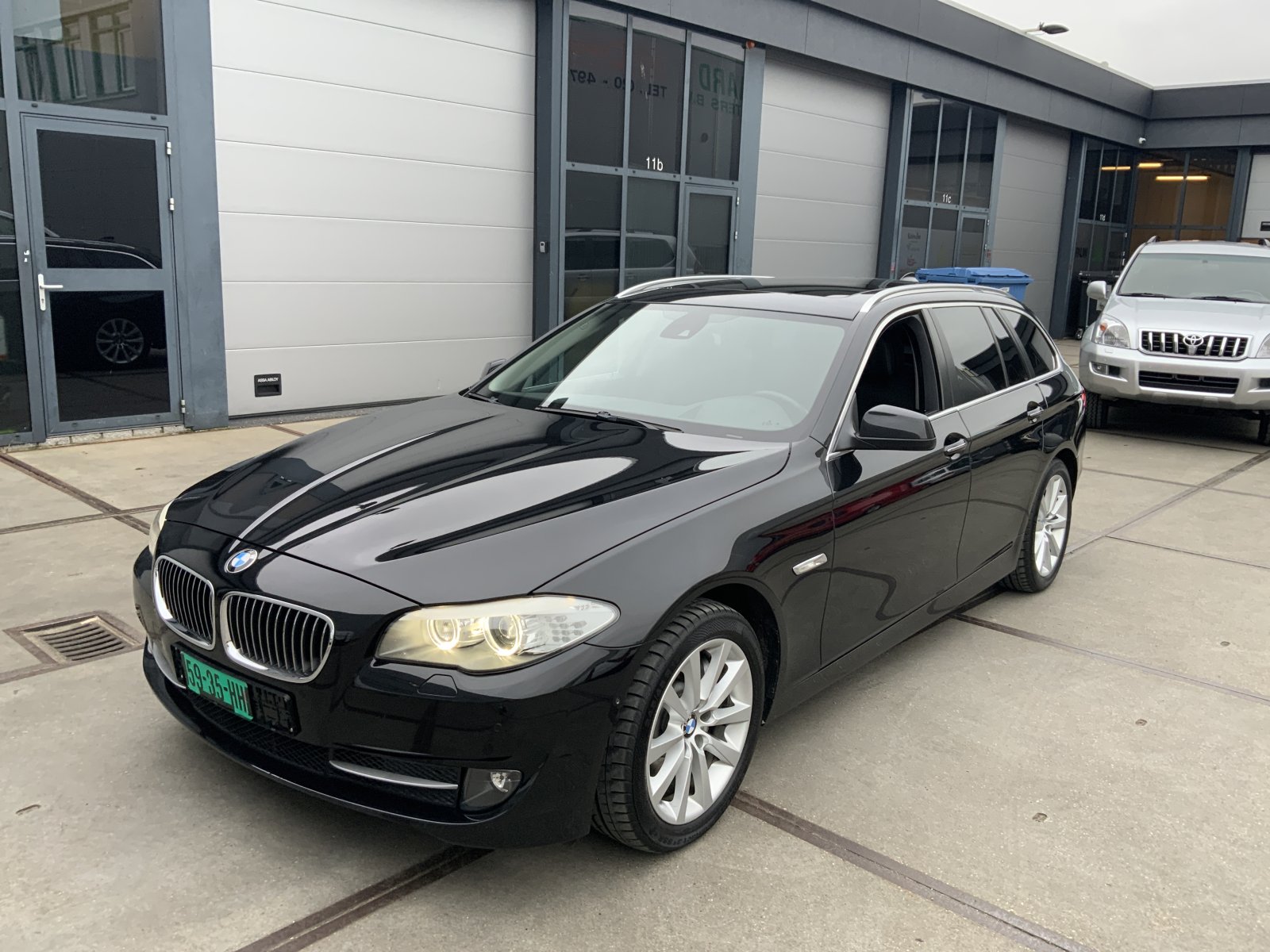 BMW 5-serie Touring 530d High Executive 2010 - voorkant