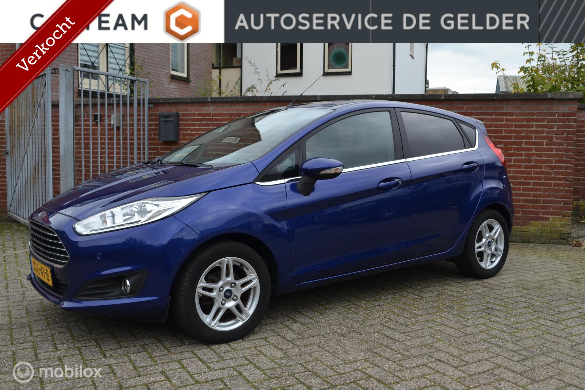 Ford Fiesta 1.0 EcoBoost Titanium | NW Distr. | Sony | PDC V+A | Stoelv | Navi | verkocht 2015 - voorkant