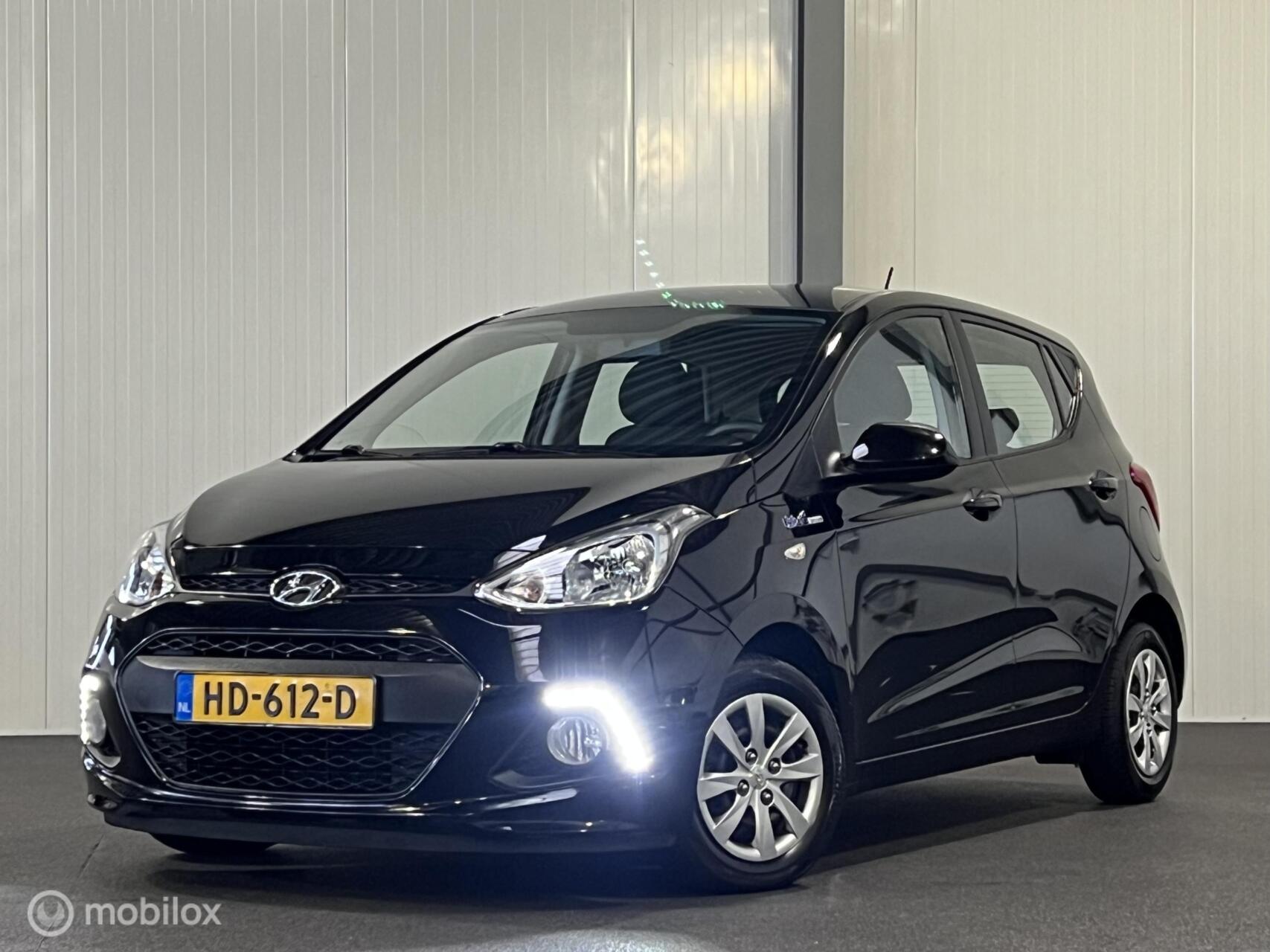 Hyundai I10 1.0i i-Motion Comfort Plus [ NAP cruise climate LED ] 2015 - voorkant