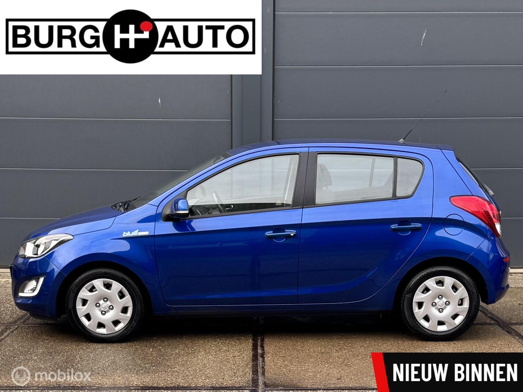 Hyundai I20 1.2i i-Motion 5 deurs - AIRCO - PDC - EL. RAMEN + SPIEGELS - CPV - RADIO/CD - NAP - 2E EIGENAAR - NL AUTO - APK T/M 31-10-2026 - 2012 - voorkant