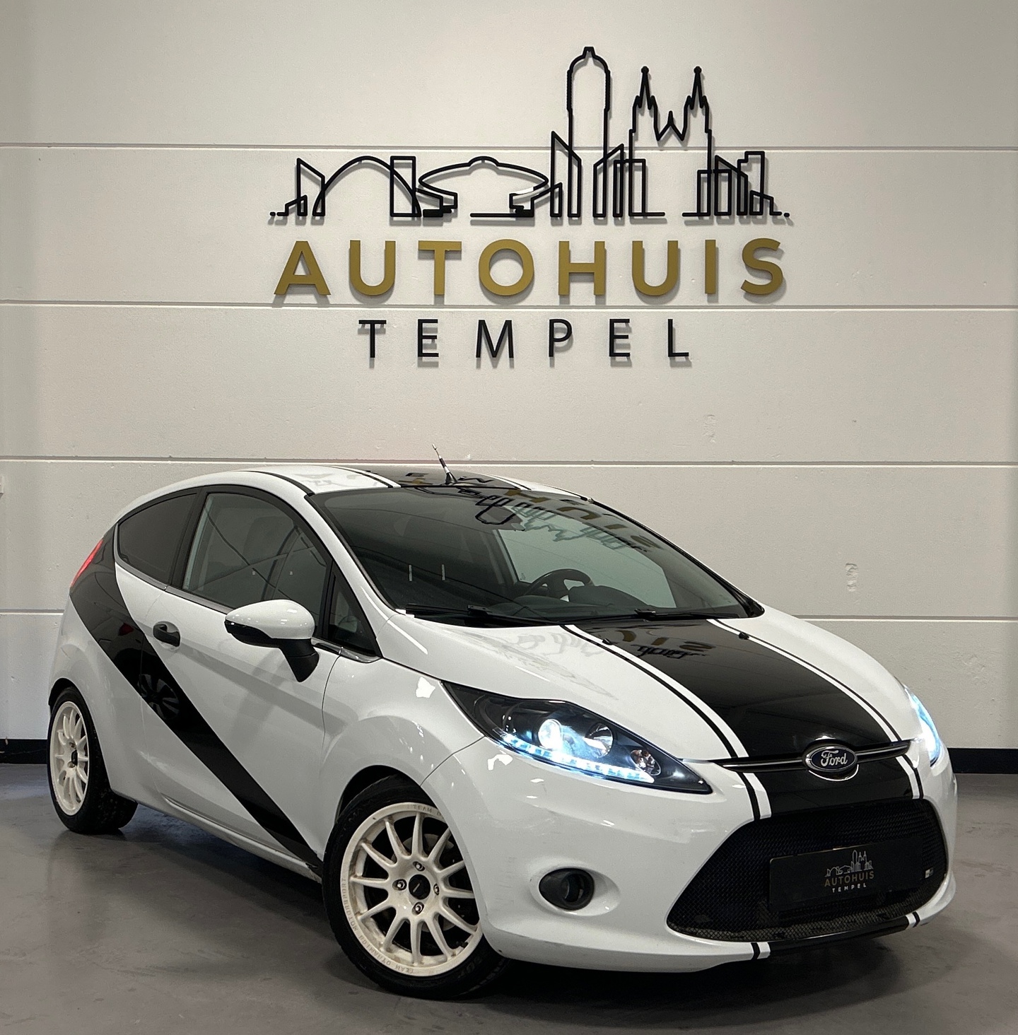 Ford Fiesta 1.6 Sport Uniek Airco 160PK  Stoelverw Bluetooth Led Verlaagd Cruise Climate 2012 - voorkant