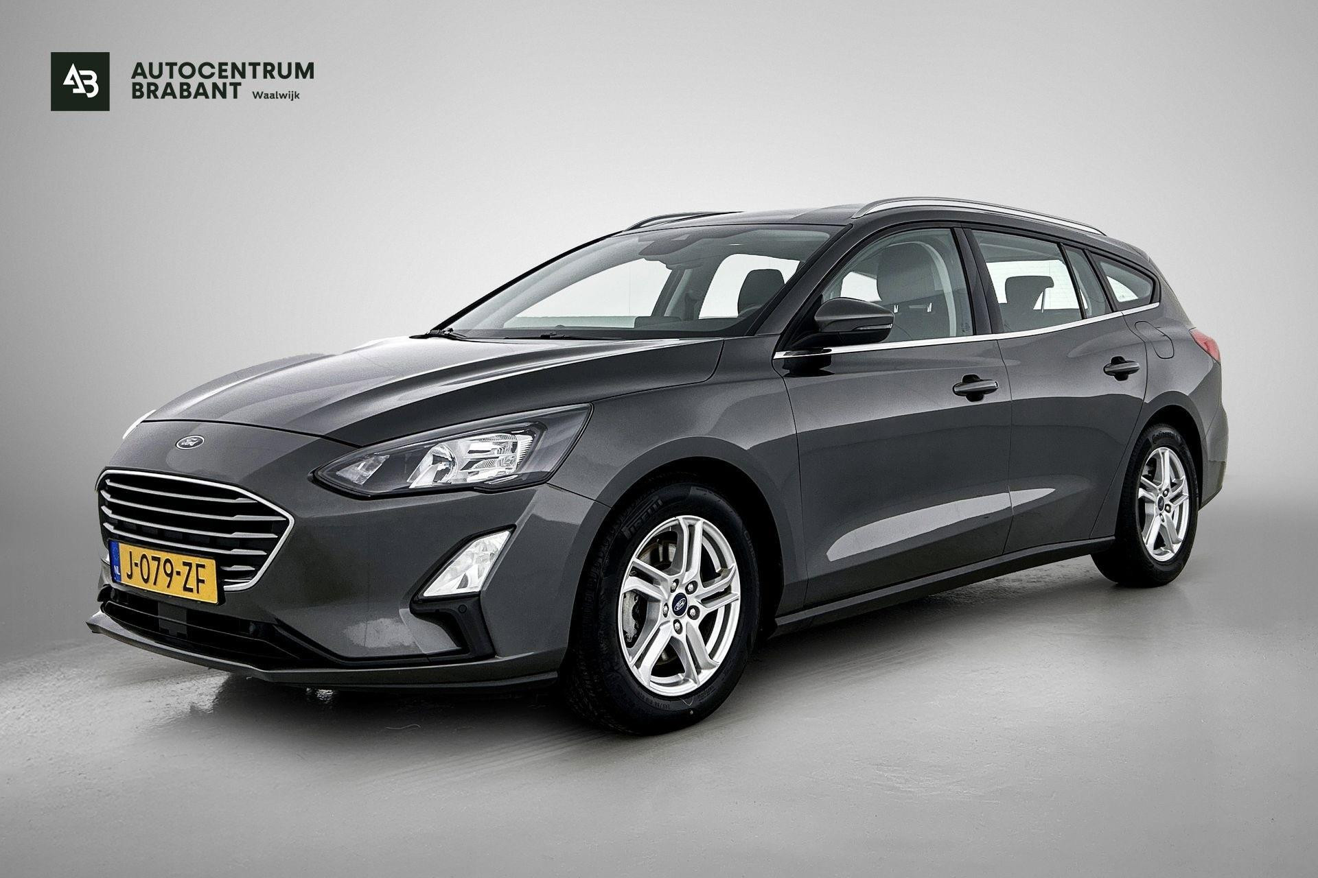 Ford Focus 1.0 EcoBoost Hybrid Edition Business (NAVIGATIE, CARPLAY, CAMERA, PARKEERSENSOREN, 1e EIGENAAR, GOED ONDERHOUDEN) 2020 - voorkant