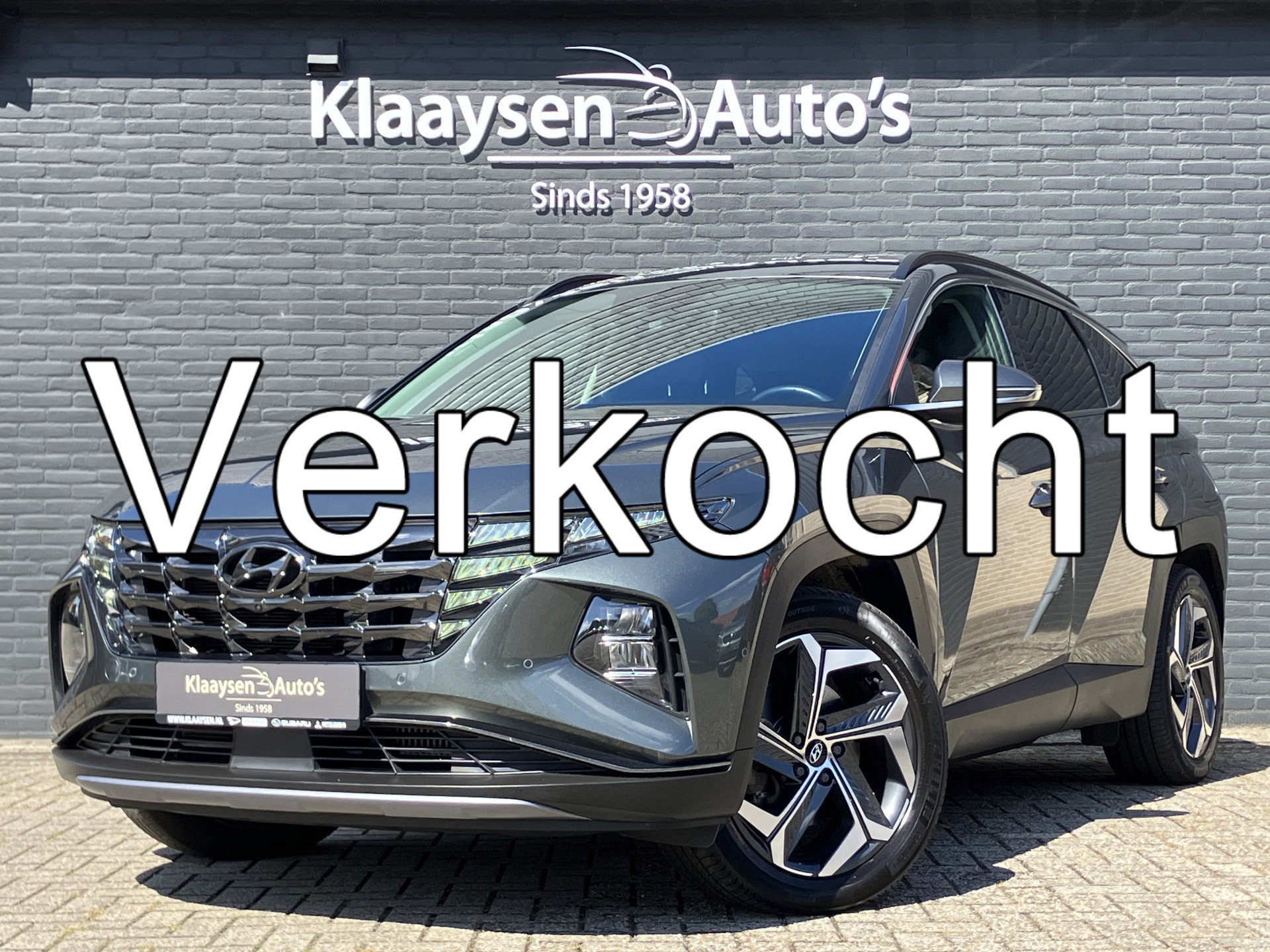 Hyundai Tucson 1.6 T-GDI PHEV Premium 265 pk 4WD AUT. | 1e eigenaar | dealer onderh. | leer | elektr. v. stoelen | 360 camera | BTW auto 2021 - voorkant