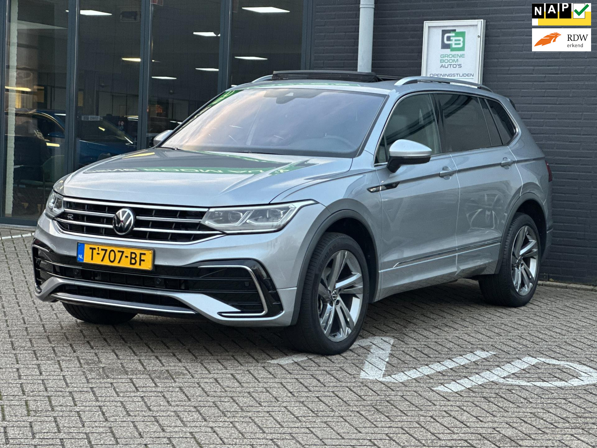 Volkswagen Tiguan 1.5 TSI R-Line Business 7p./PANO-DAK/CAMERA/NL-AUTO NAP!! 2023 - voorkant