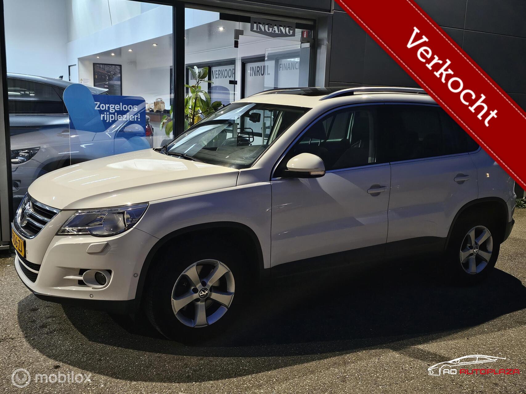 Volkswagen Tiguan 1.4 TSI Sport&Style Panorama/PDC LEES TEKST 2010 - voorkant