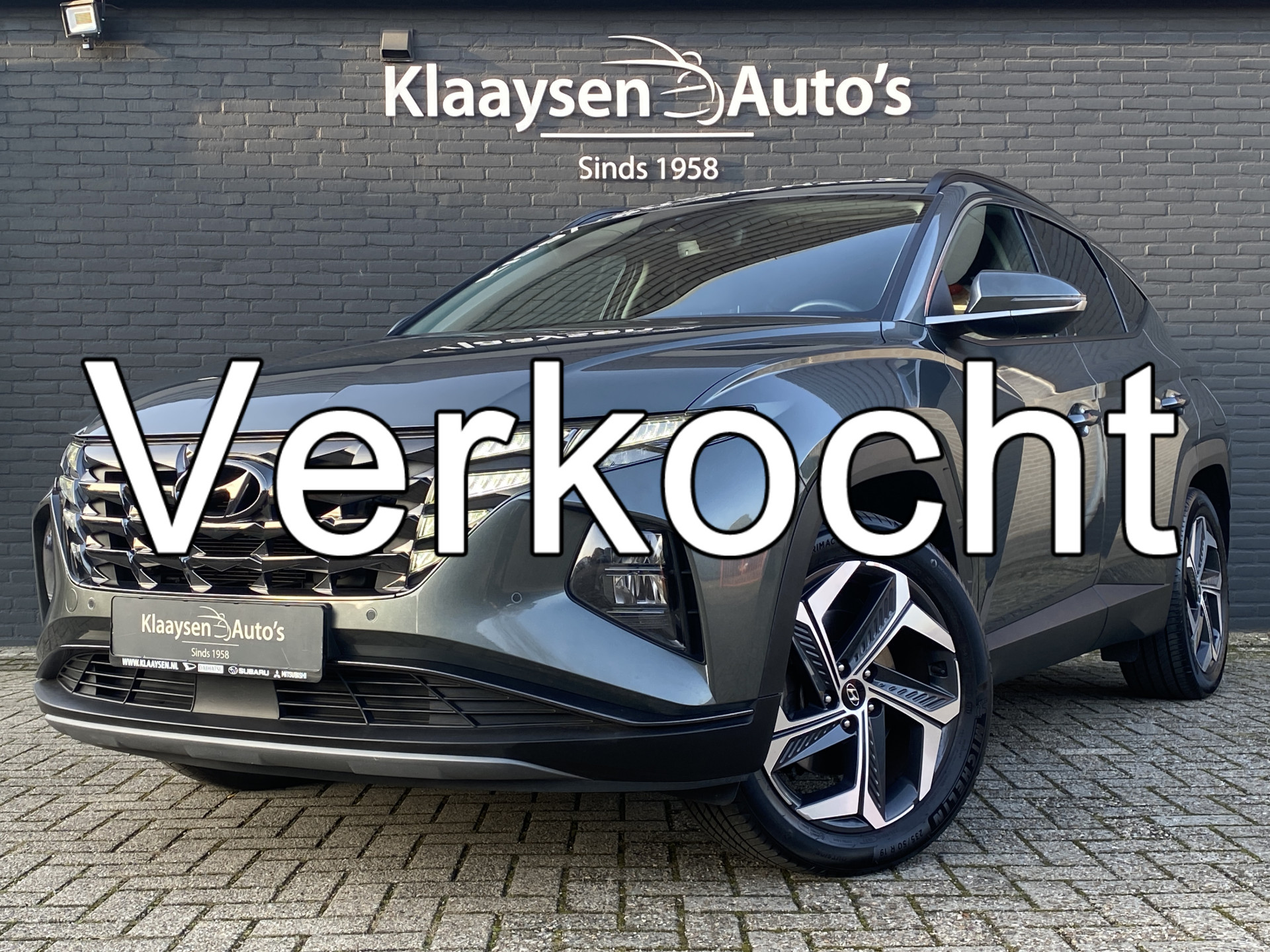 Hyundai Tucson 1.6 T-GDI PHEV Comfort Smart 265 pk 4WD | 1e eigenaar | dealer onderh. | navigatie | adaptieve cruise | camera 2022 - voorkant