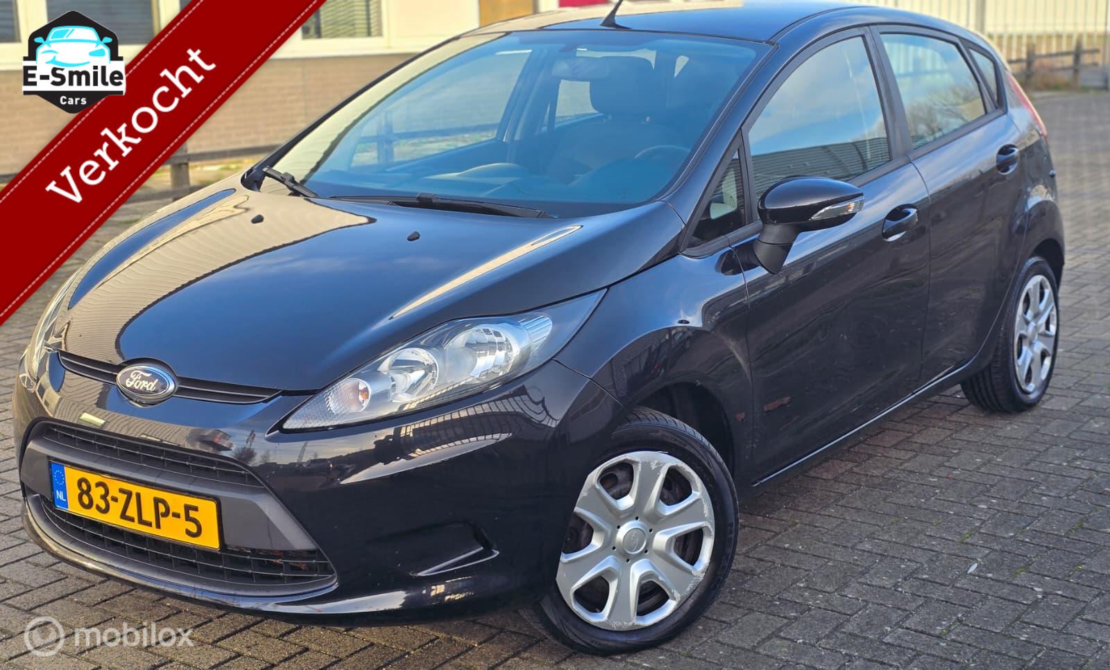 Ford Fiesta 1.25 Champion/Airco/AUX/Trekhaak/EleckRamen/APK 2013 - voorkant