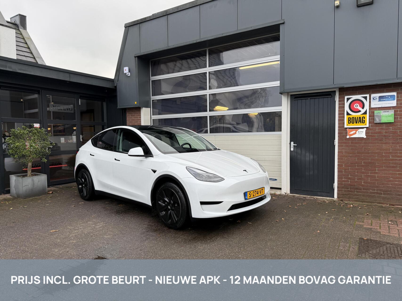 Tesla Model Y RWD 58 kWh SOH 94% *ALL-IN PRIJS* 2023 - voorkant