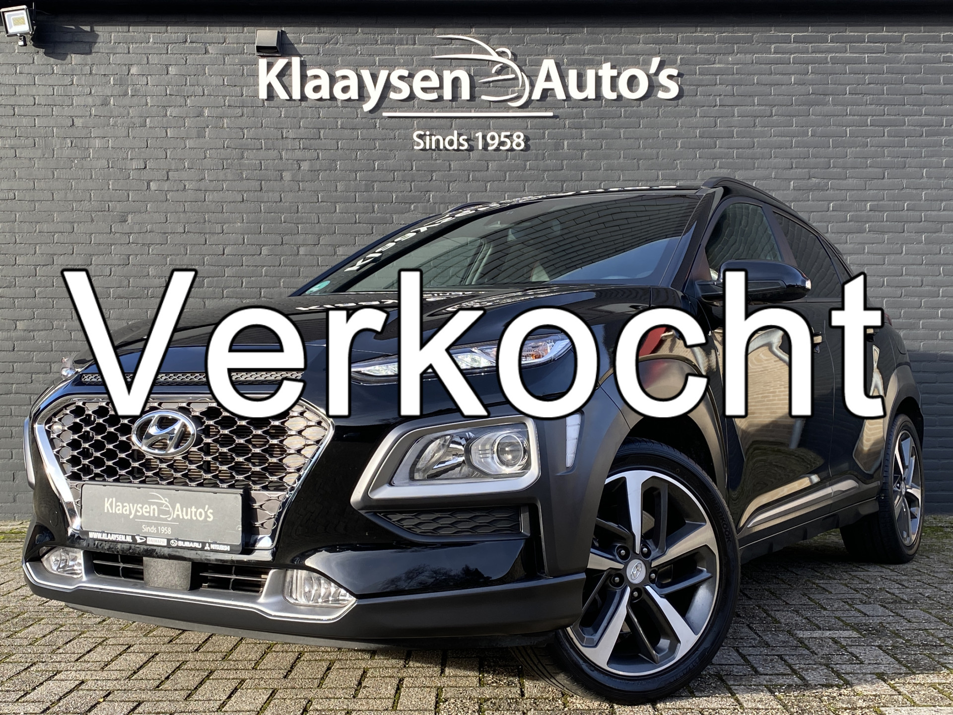 Hyundai Kona 1.6 T-GDI Premium 177 pk AUT. | 1e eigenaar | dealer onderh. | navigatie | camera | stoel/stuurverwarming 2020 - voorkant