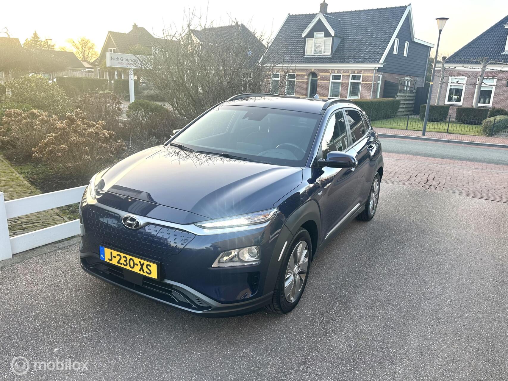 Hyundai Kona EV Fashion Design 64 kWh SOH 100% ACCU GARANTIE TOT EN MET 2028 CARPLAY CAMERA STOELVERWARMING ZEER COMPLETE AUTO!! 2020 - voorkant