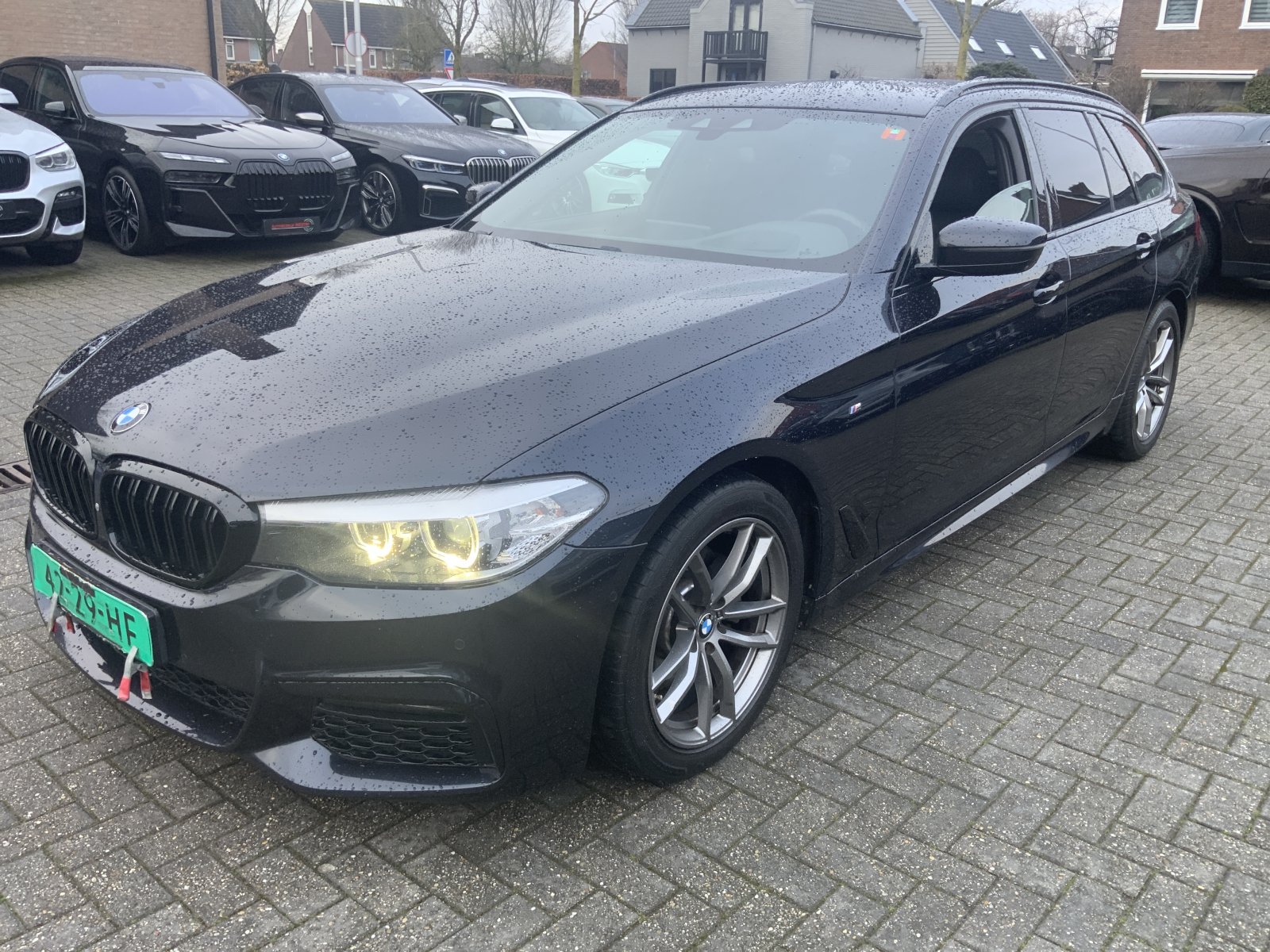 BMW 5-serie Touring 520d High Exe 2019 - voorkant