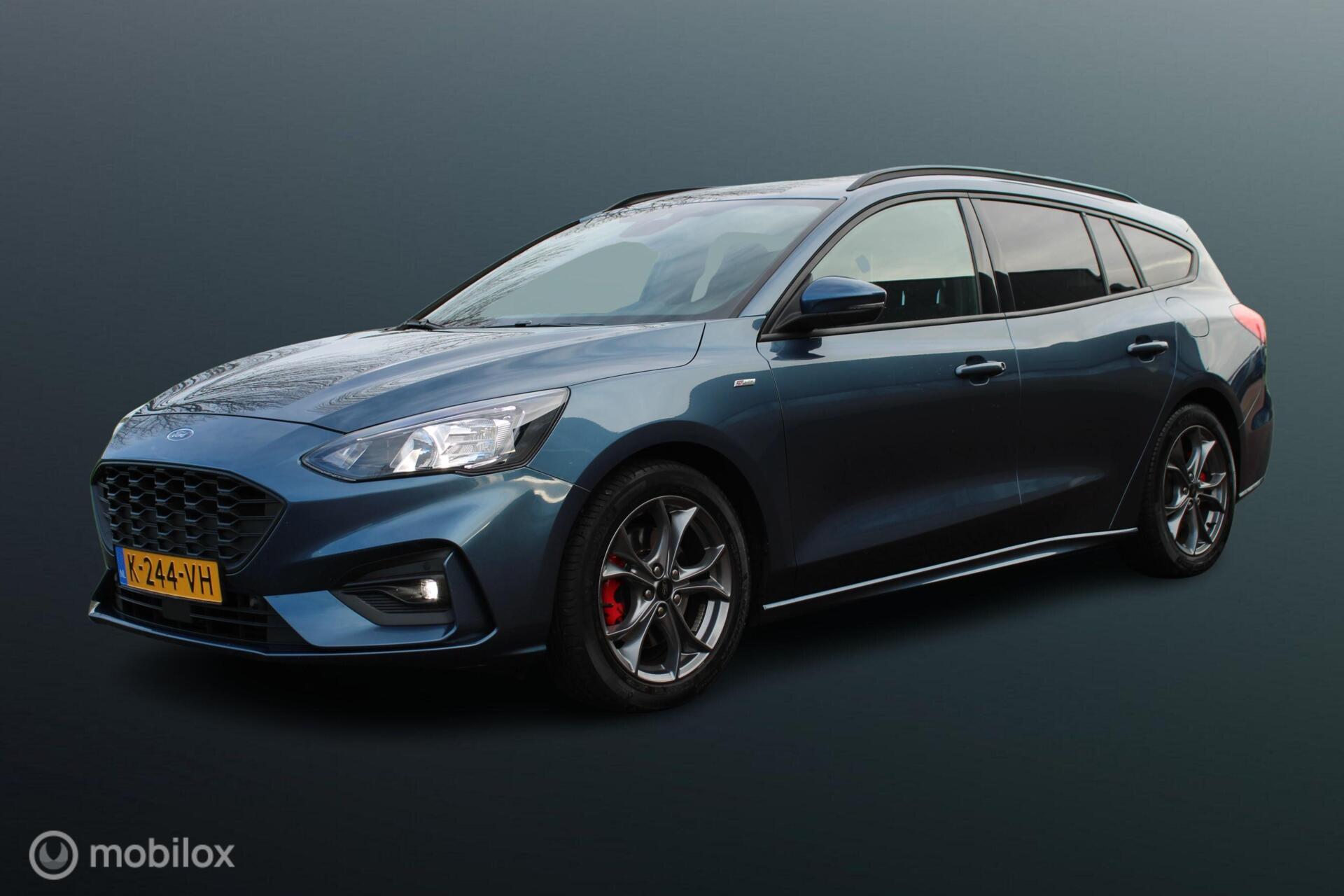 Ford Focus 1.0 EcoBoost Hybrid ST Line X Business, Camera, Electrische achterklep, Voor + achter Pdc, App connect, Digitaal dashboard, Clima, Navi, Donker glas, Carbon interieur, Rode remklauwen, Zwarte dakrails, 17 Inch Lmv. 2021 - voorkant