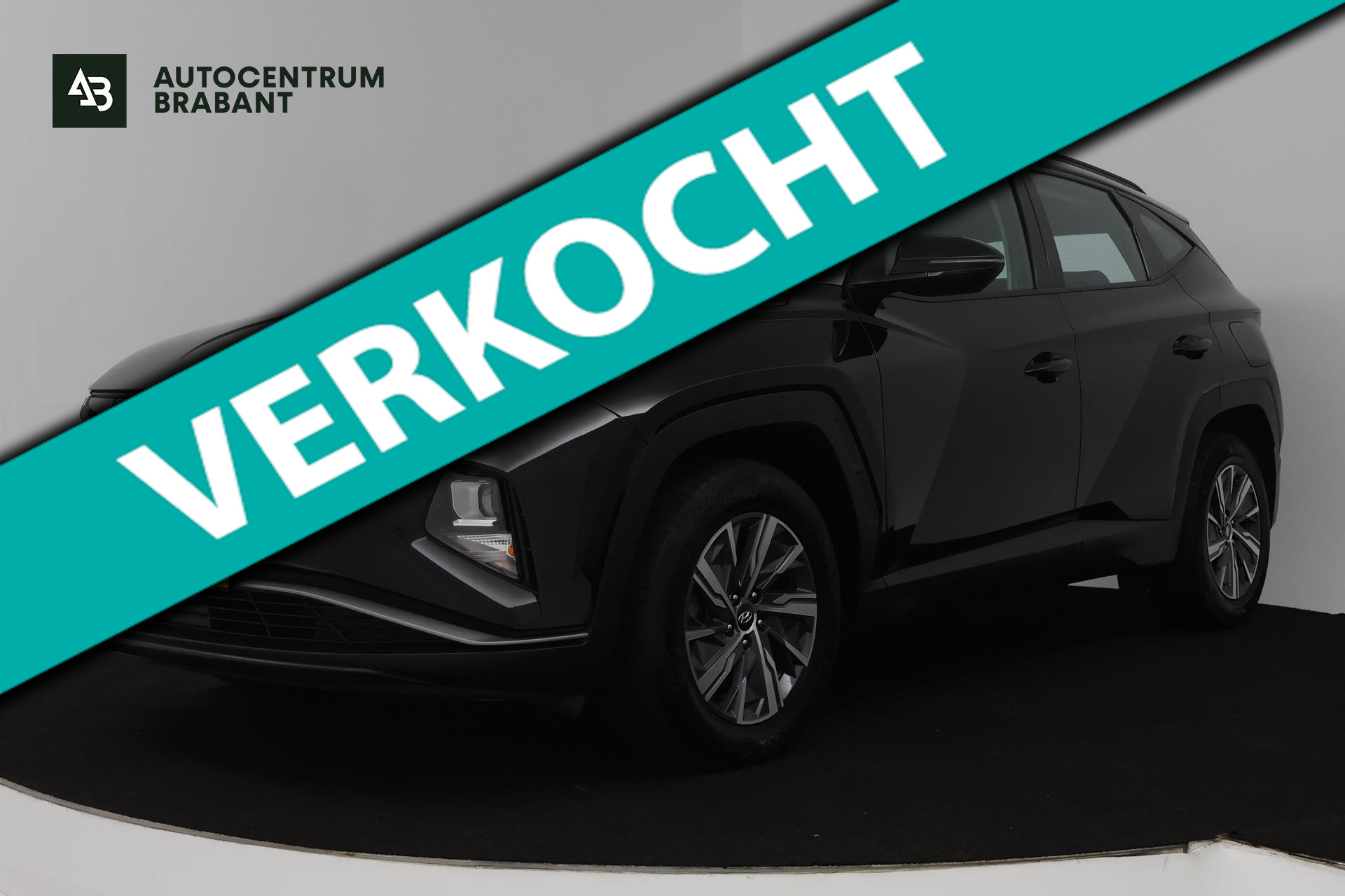 Hyundai Tucson 1.6 T-GDI HEV i-Motion (TREKHAAK, ACHTERUITRIJCAMERA, DIGITALE COCKPIT, PARKEERSENSOREN) 2021 - voorkant