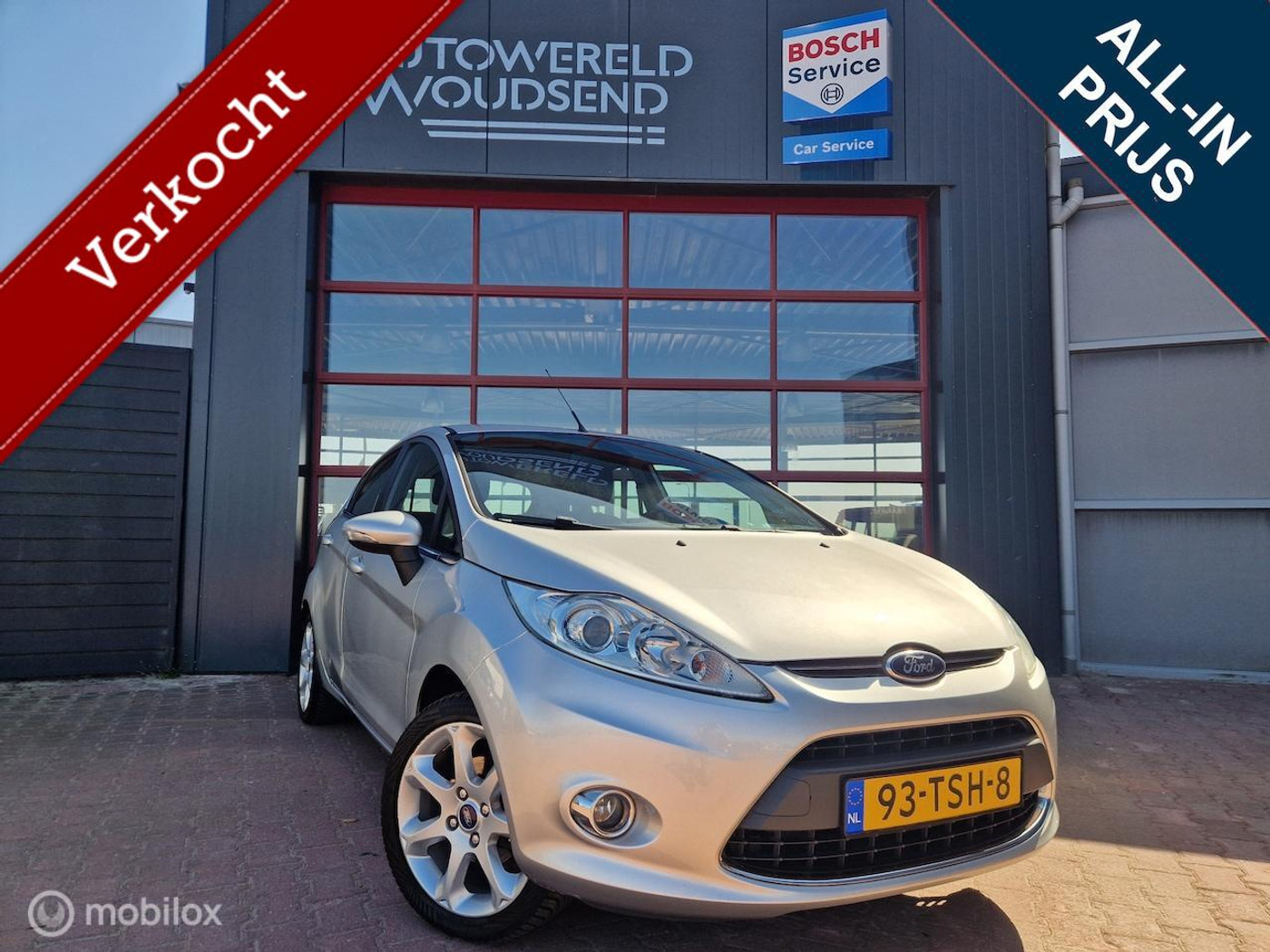 Ford Fiesta 1.25 Titanium 12 MND BOVAG GAR | LEER | CLIMA | STOELVERW | PDC | TREKHAAK | VERW VOORRUIT 2012 - voorkant